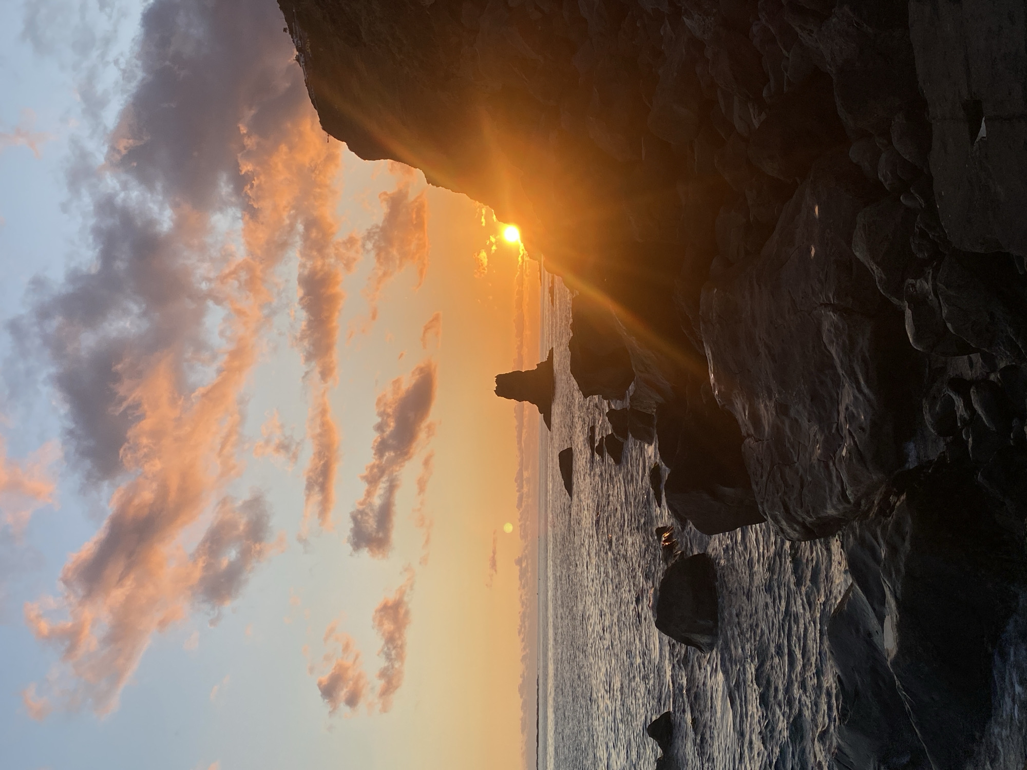 Calm sunset along Ribeira Brava's rocky Atlantic shoreline
