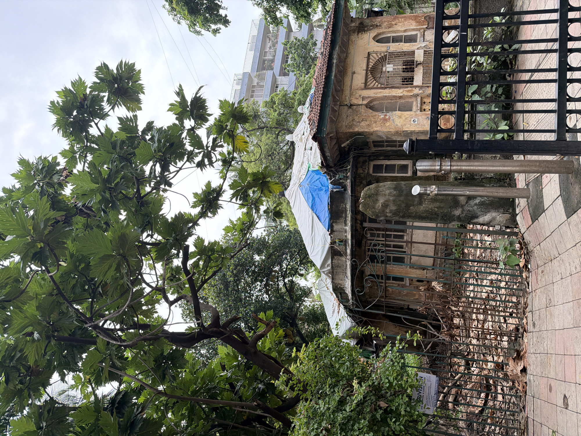 Old buildings, new towers, and a Mumbai auto-rickshaw fare ticking up
