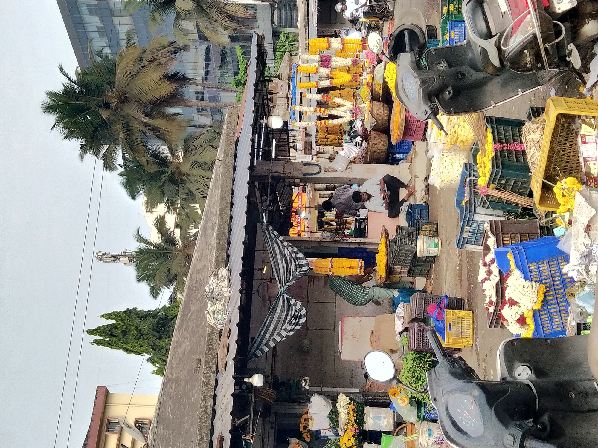Early morning flower market activity documented in Panaji, India