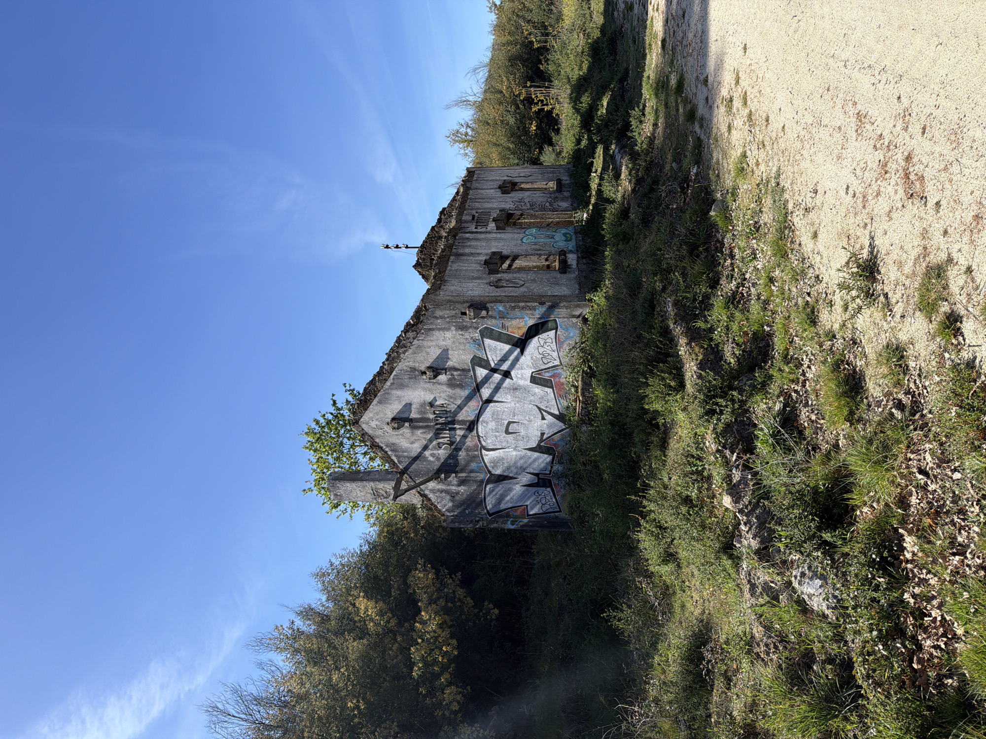 Damaged graffiti-covered building ruins documented in Vila Real Portugal