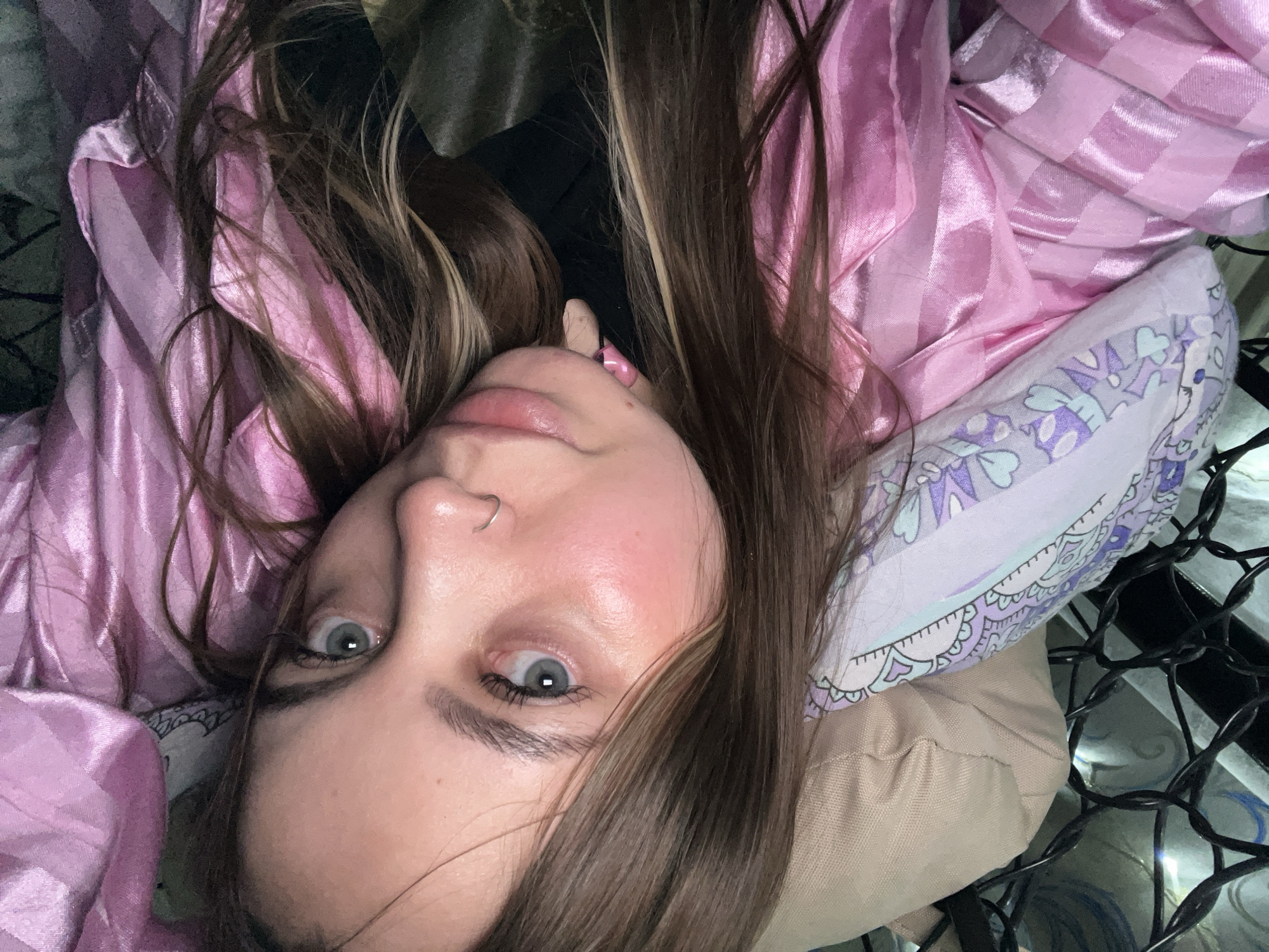 Woman photographed in bedroom in Novopokrovskaya, Russia