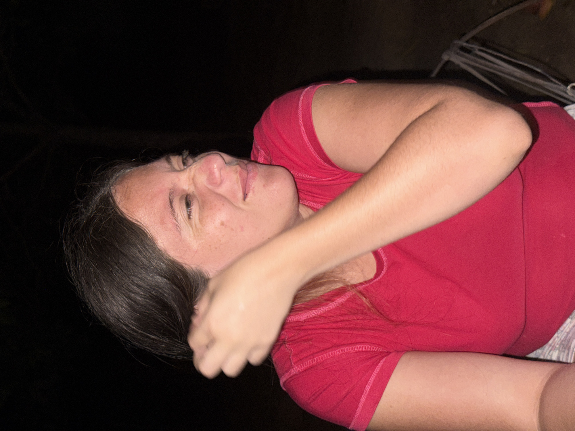 Woman in red shirt observed lying down in El Bajío