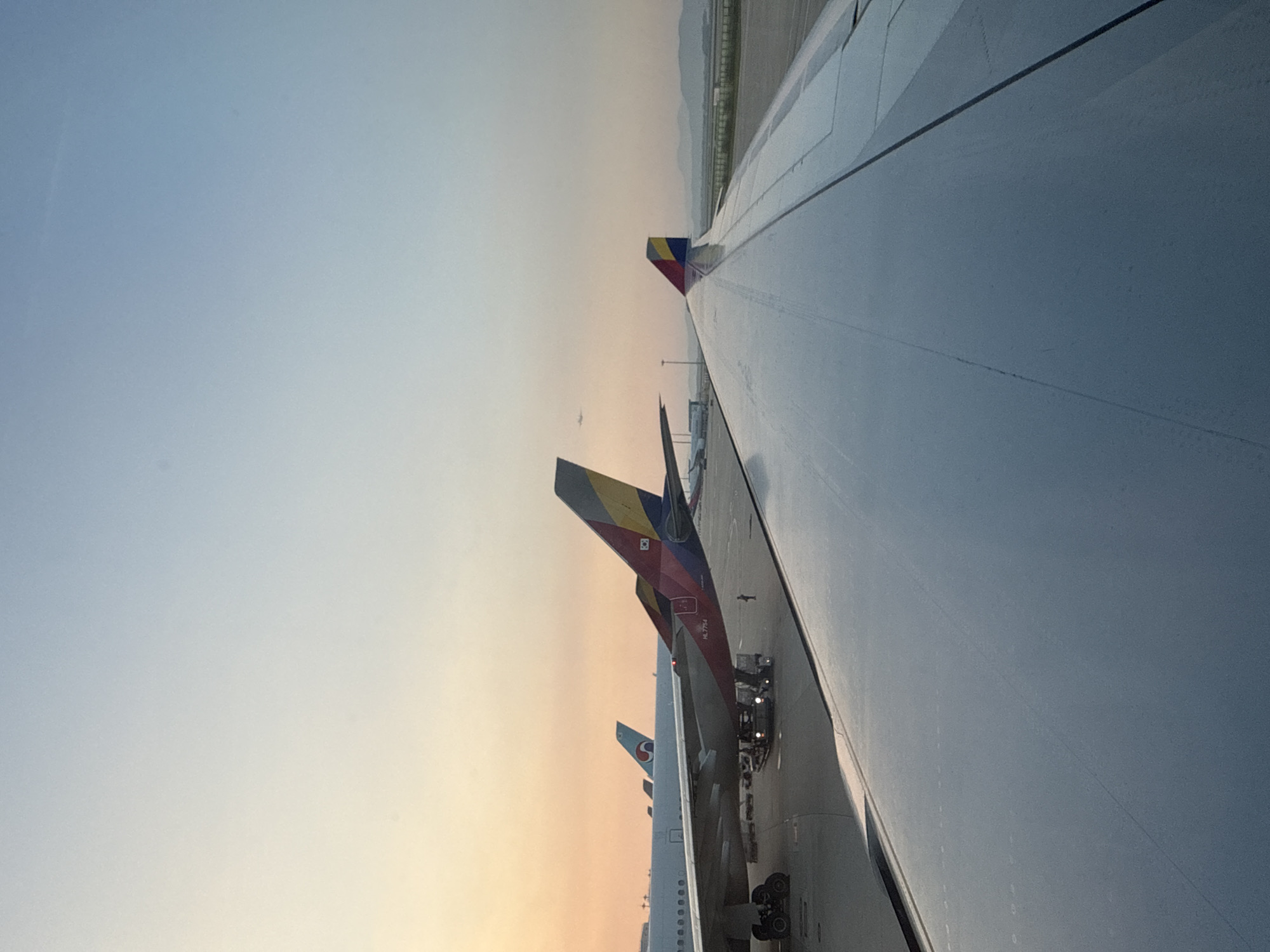 Airport at golden hour, tarmac and control tower views