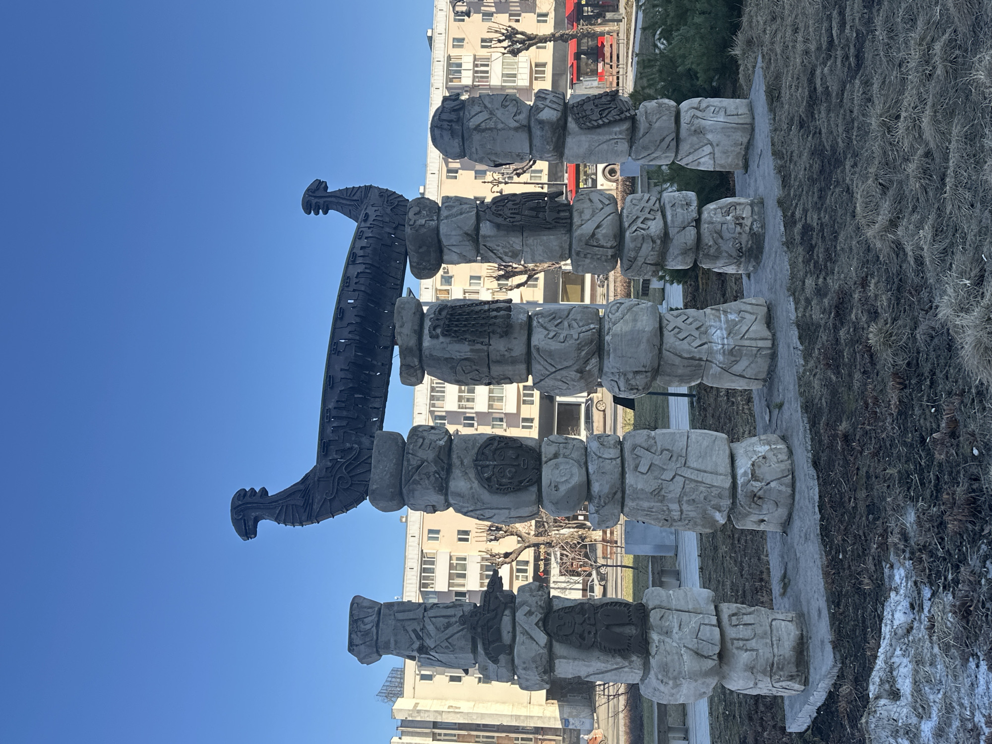 Stone monument with dragon sculpture documented in Perm, Russia