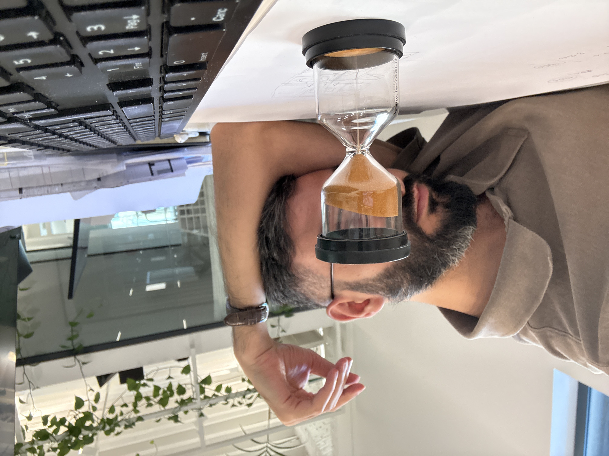 Midday burnout at a Milan office desk