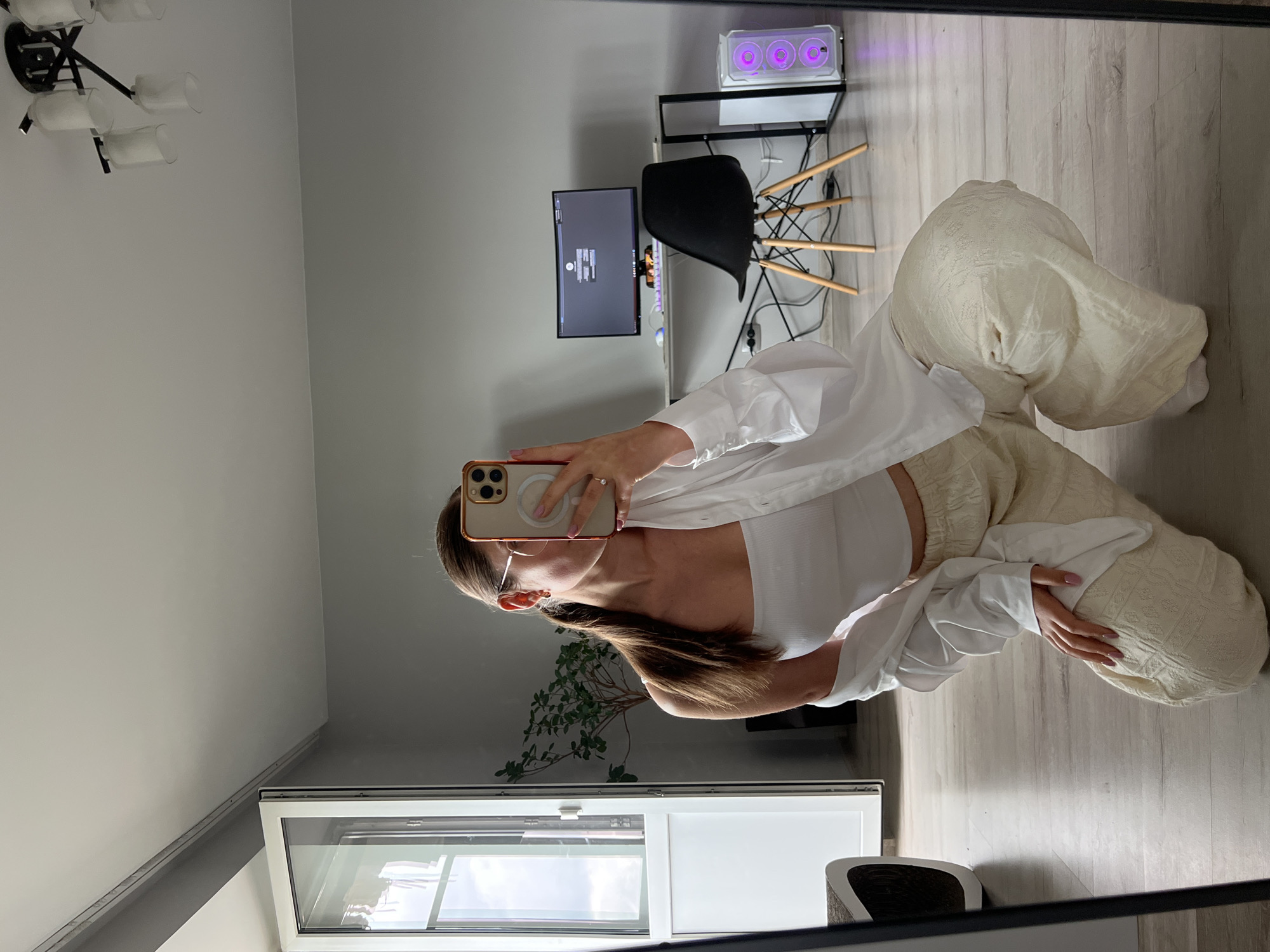 Mirror selfie session in a Ternopil apartment, summer outfit