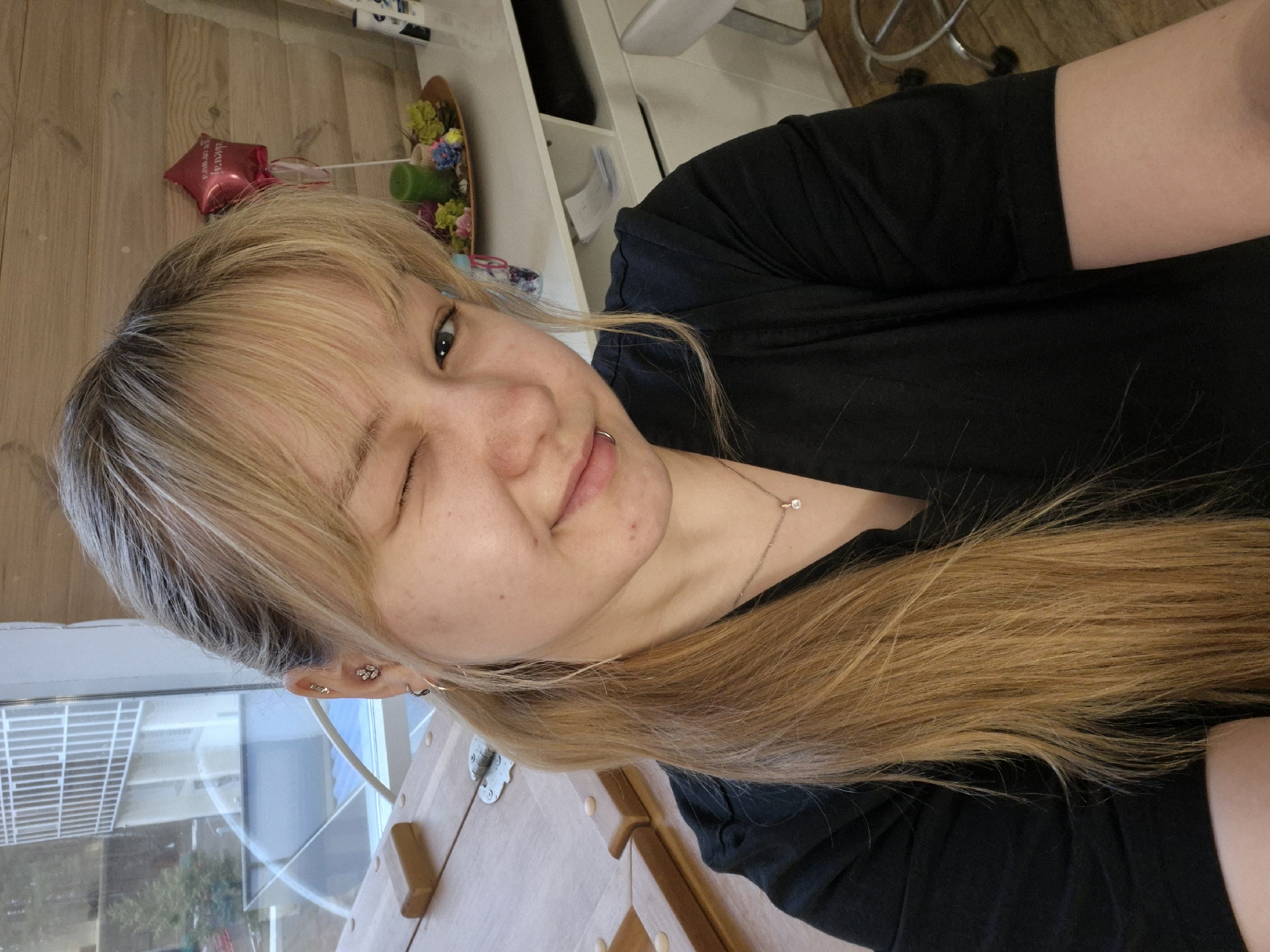 Woman takes morning selfie in Chaikovsky building interior