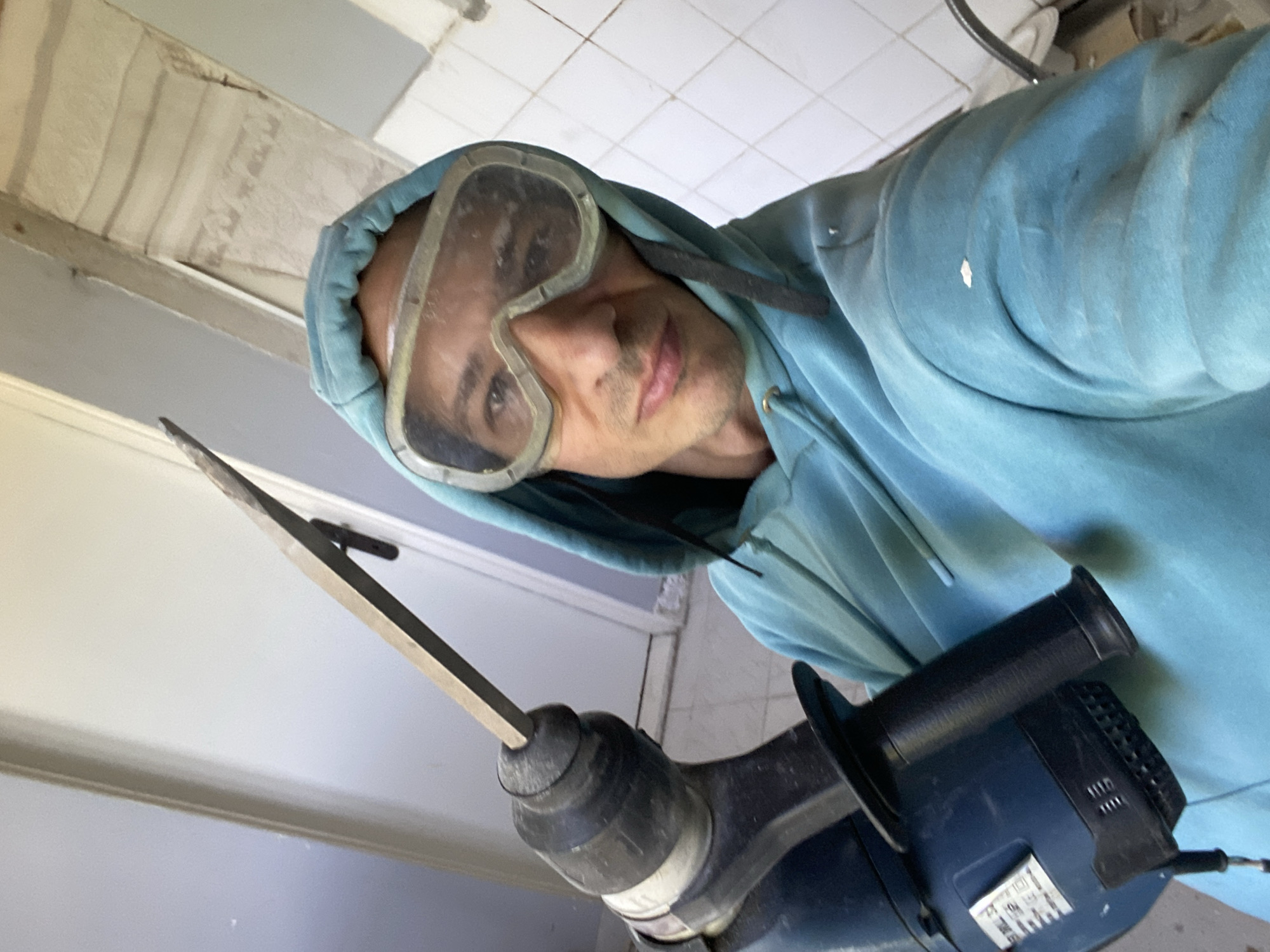 Jackhammer work in a tiled interior, Pleven