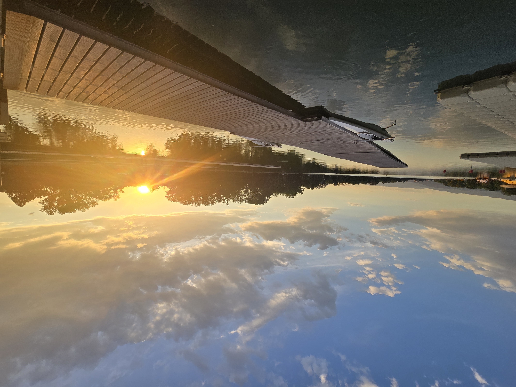 Waterfront sunset scenes with docks and EU displays documented