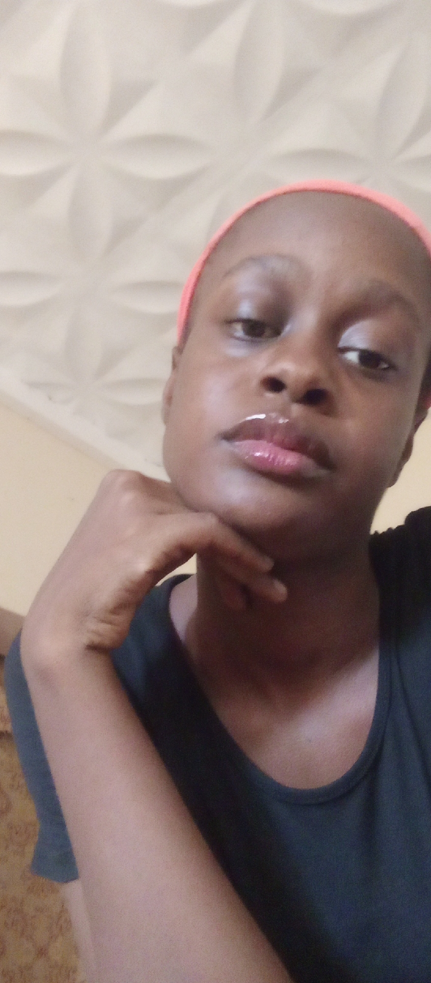 Woman speaks indoors, garden scenes recorded in Akwanga, Nigeria