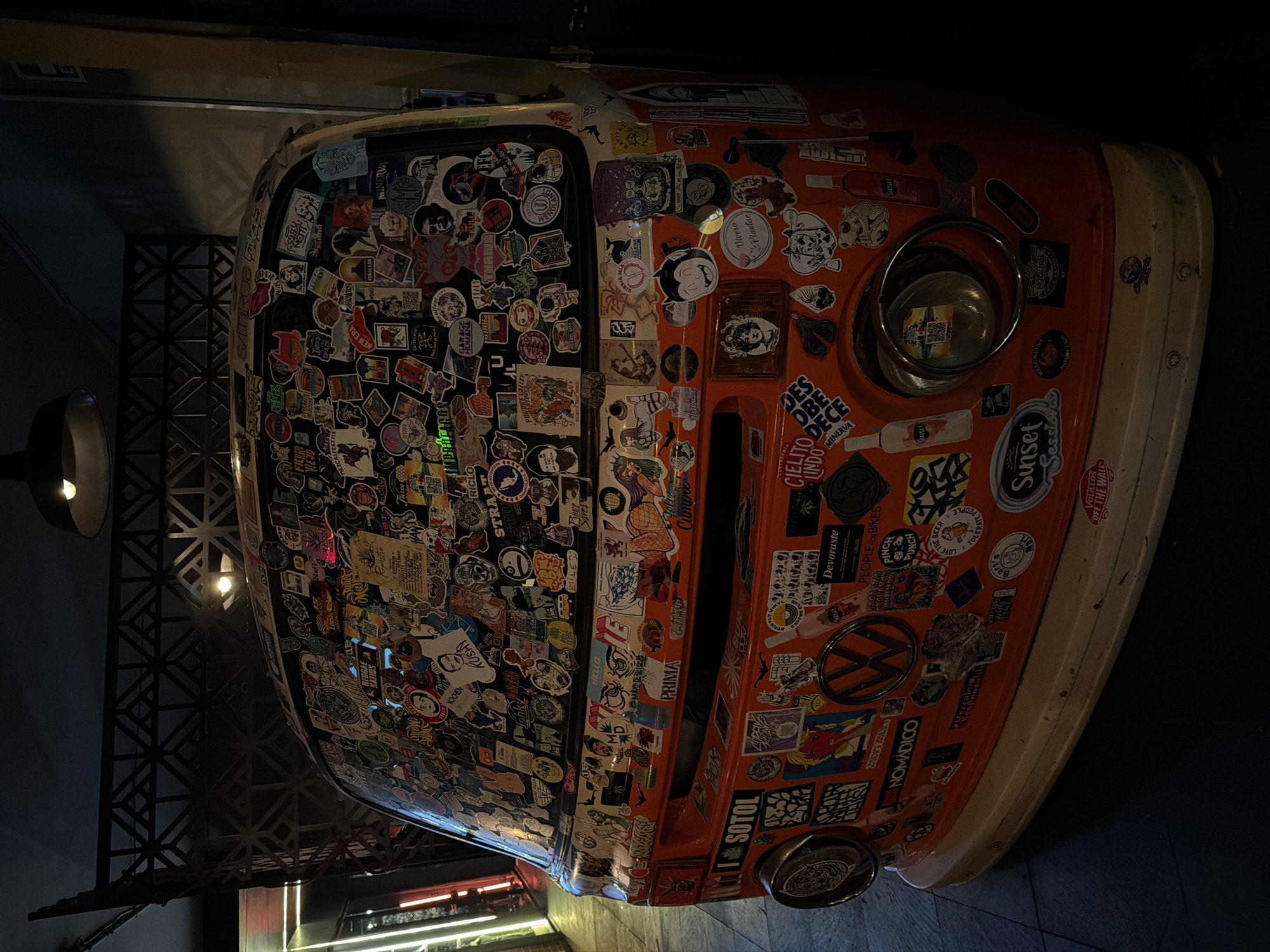 Sticker-covered orange VW van spotted near Mexico City bar