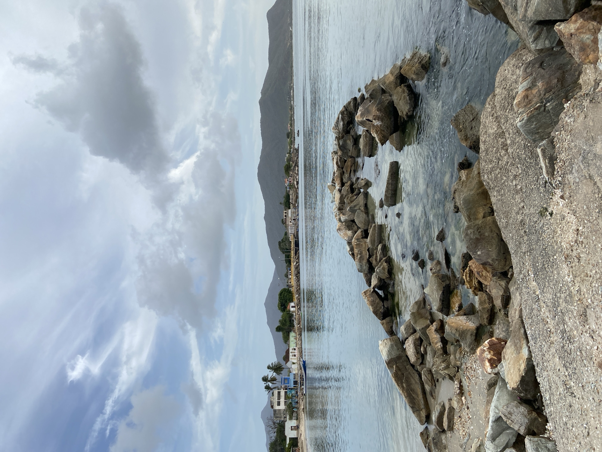 Juan Griego's fishing pier on a quiet, overcast evening
