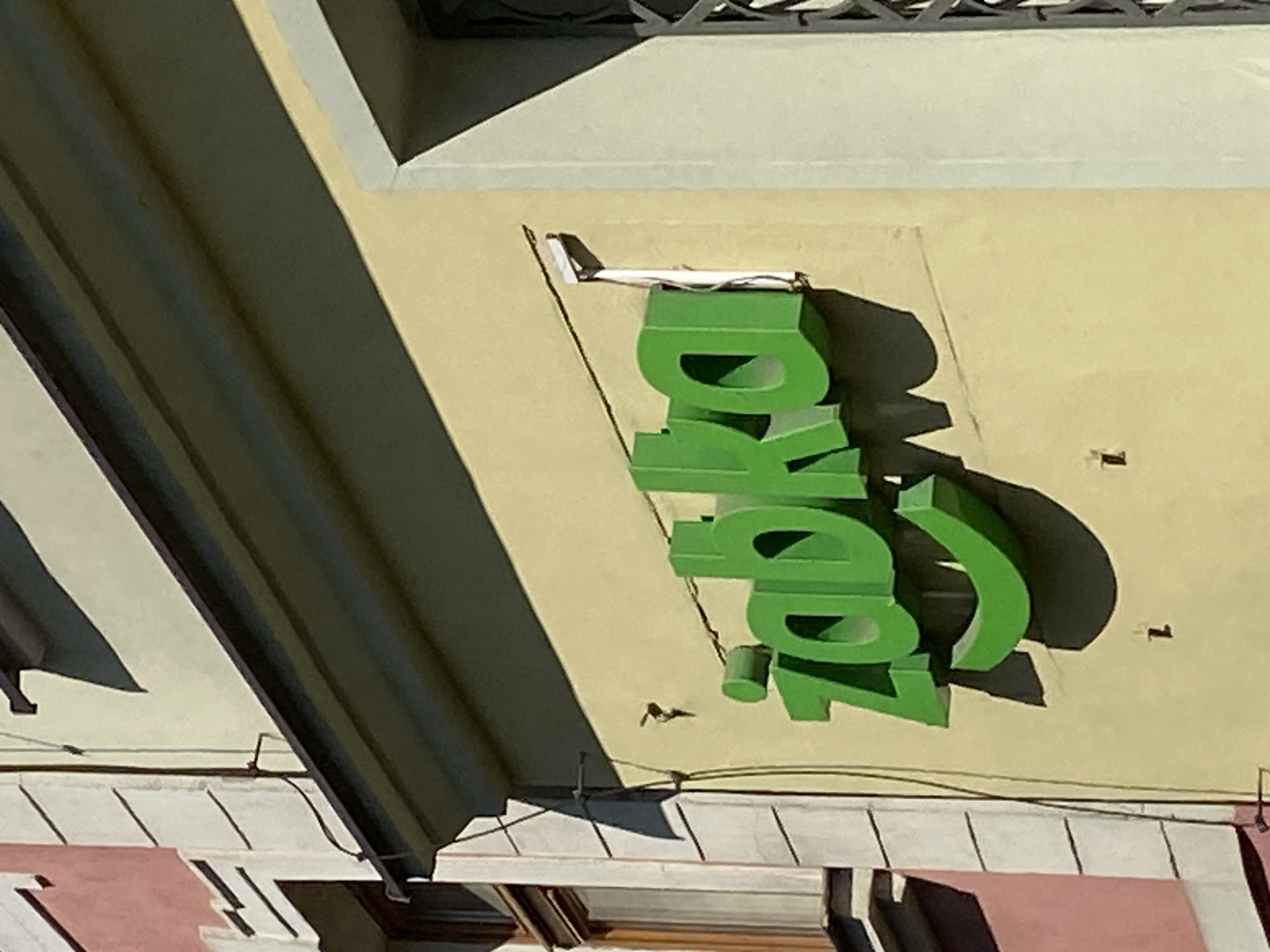 Tourist documents historic Wrocław Old Town shops and sculptures