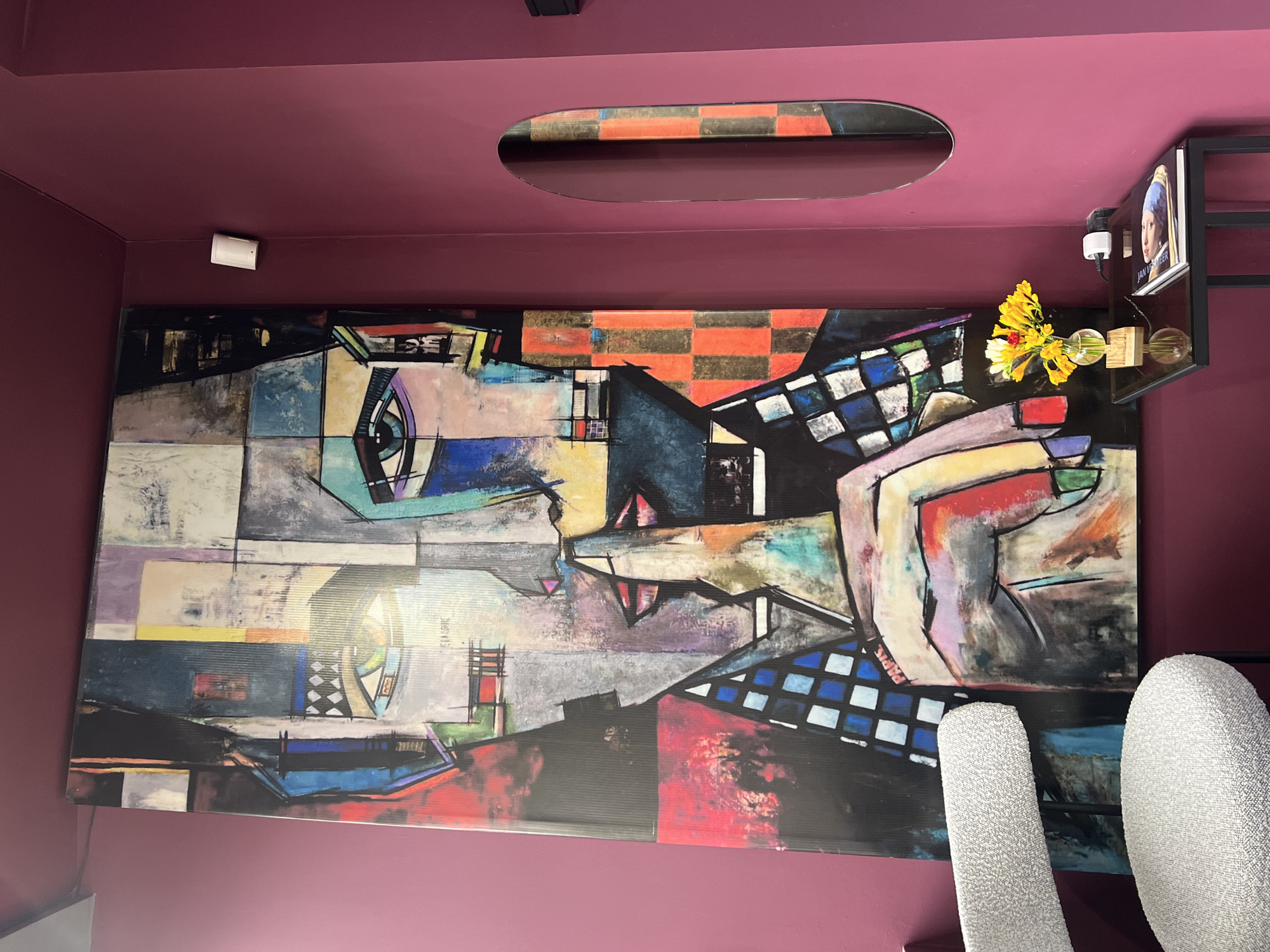 Cubist-style abstract painting observed in Yerevan interior space