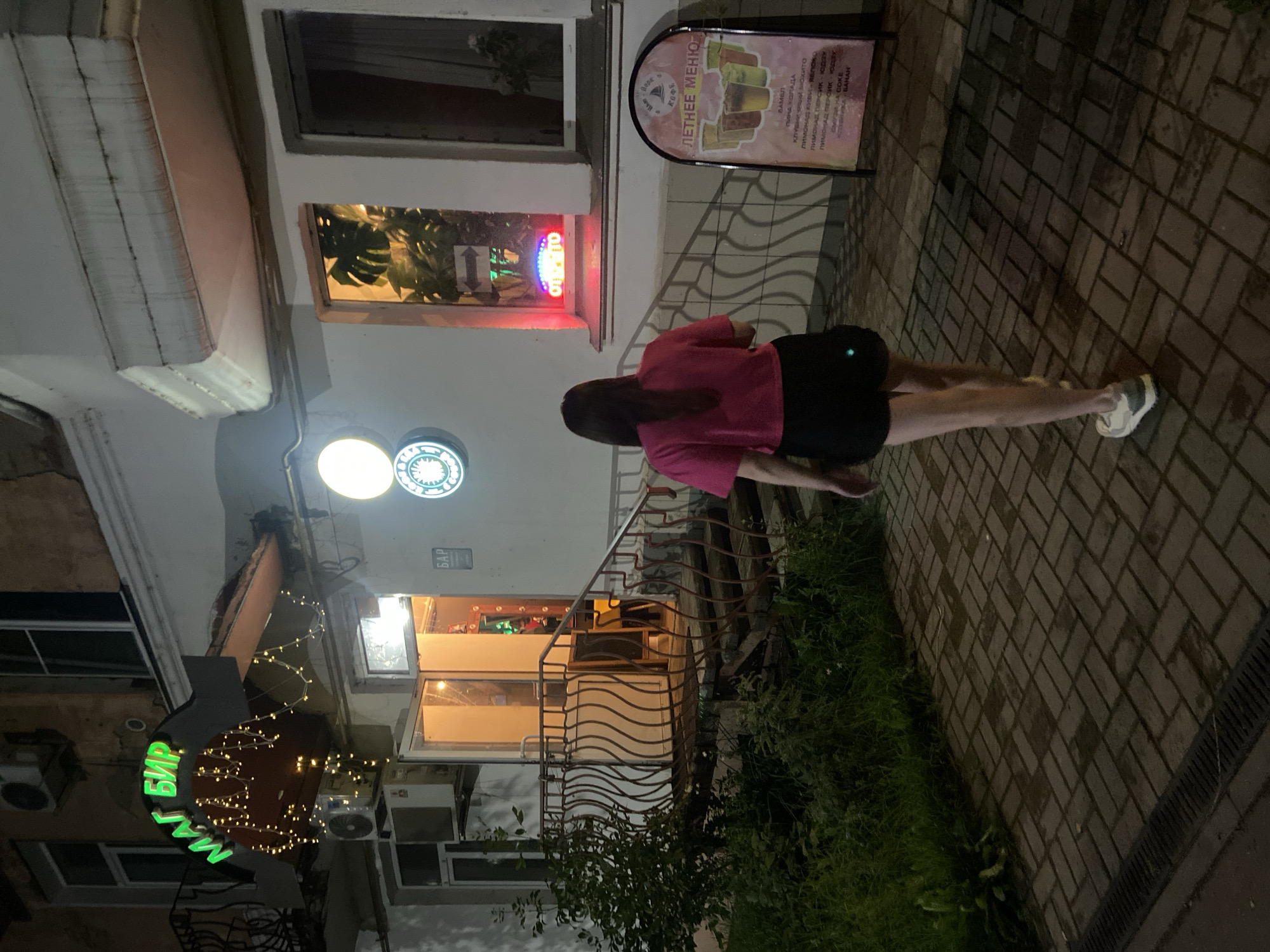 Night out at a neon-lit bar in Votkinsk, Russia