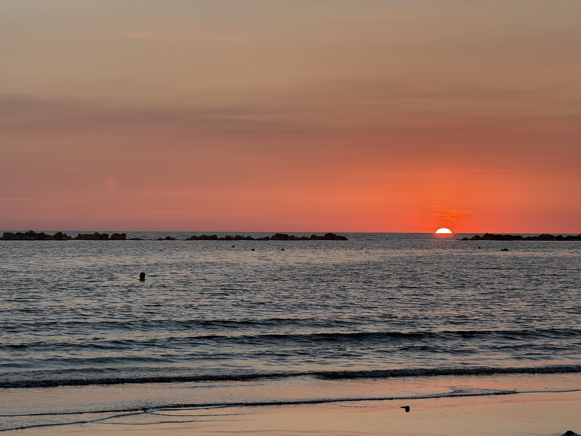 Golden hour at the Anzio shoreline, Mediterranean calm