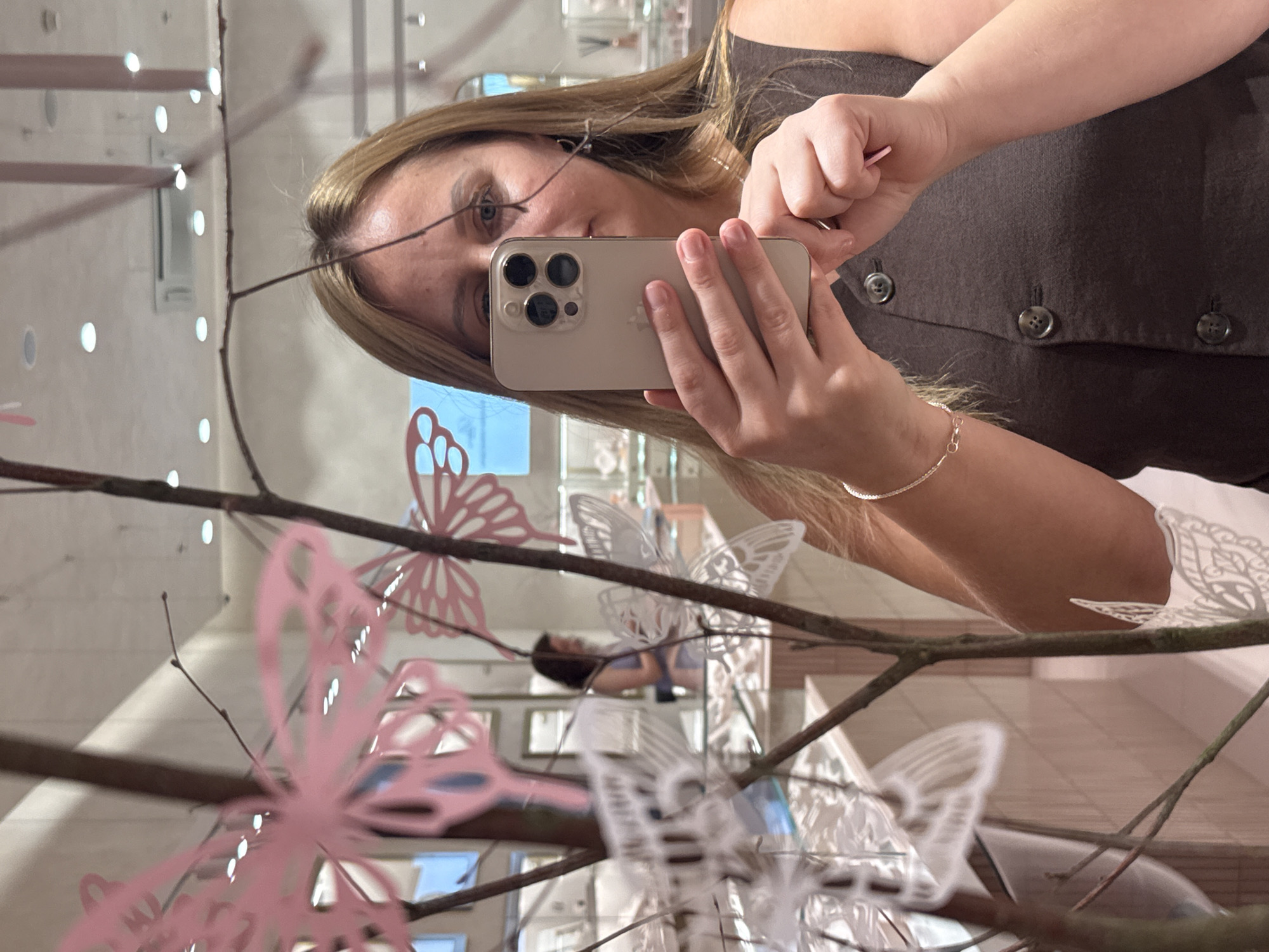 Trying on jewelry at a Prague boutique