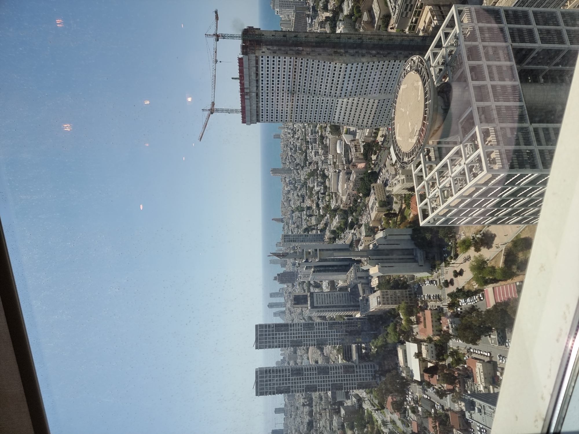 Panoramic coastal city view captured from elevated position in Jordan