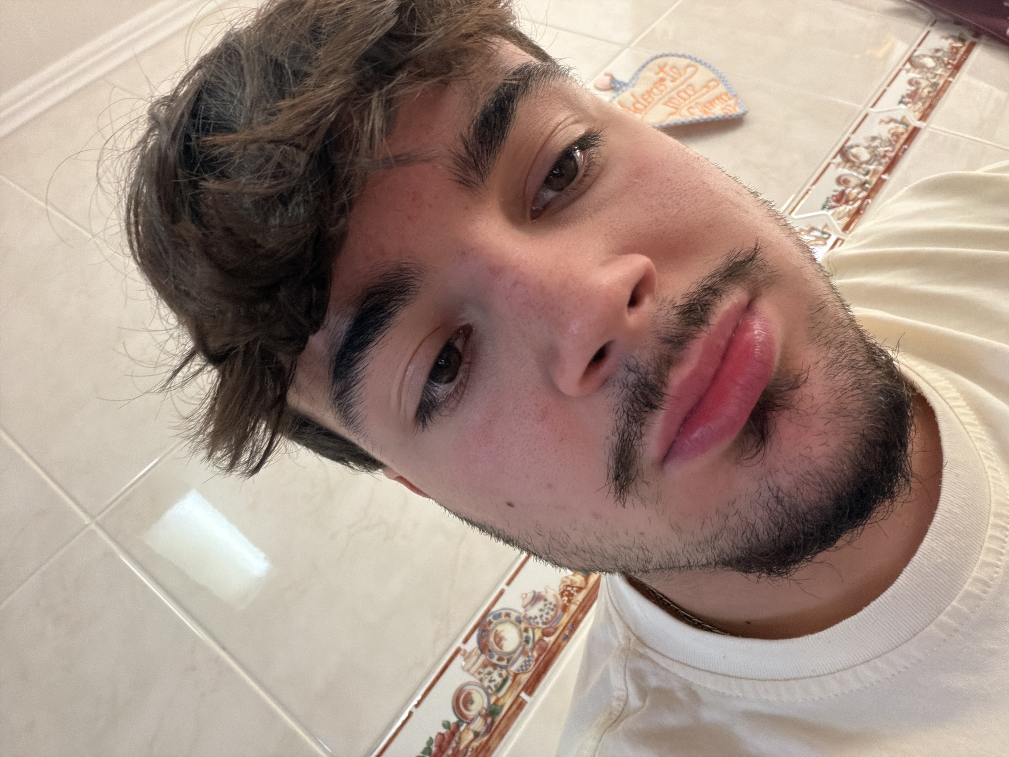 Young man takes selfies in Vila Real, Portugal