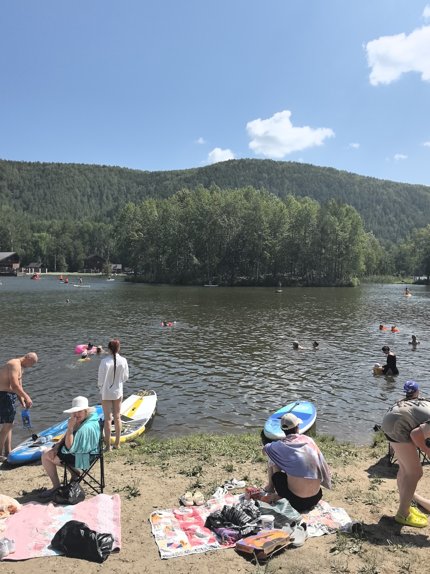 Paddleboarding and beach hangouts on a Russian lake