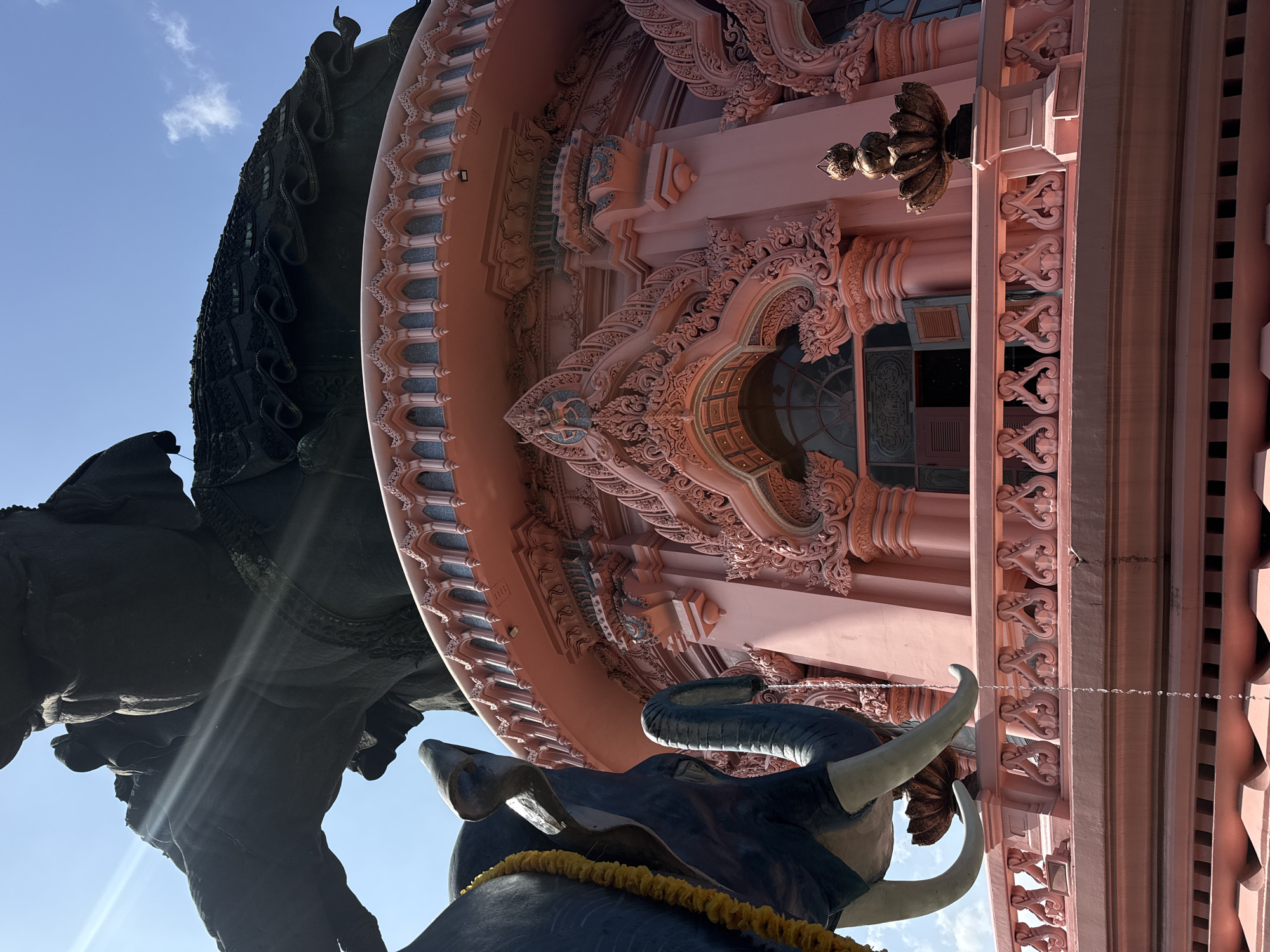 Exploring a quirky cultural site with statues, antiques, and a live turtle