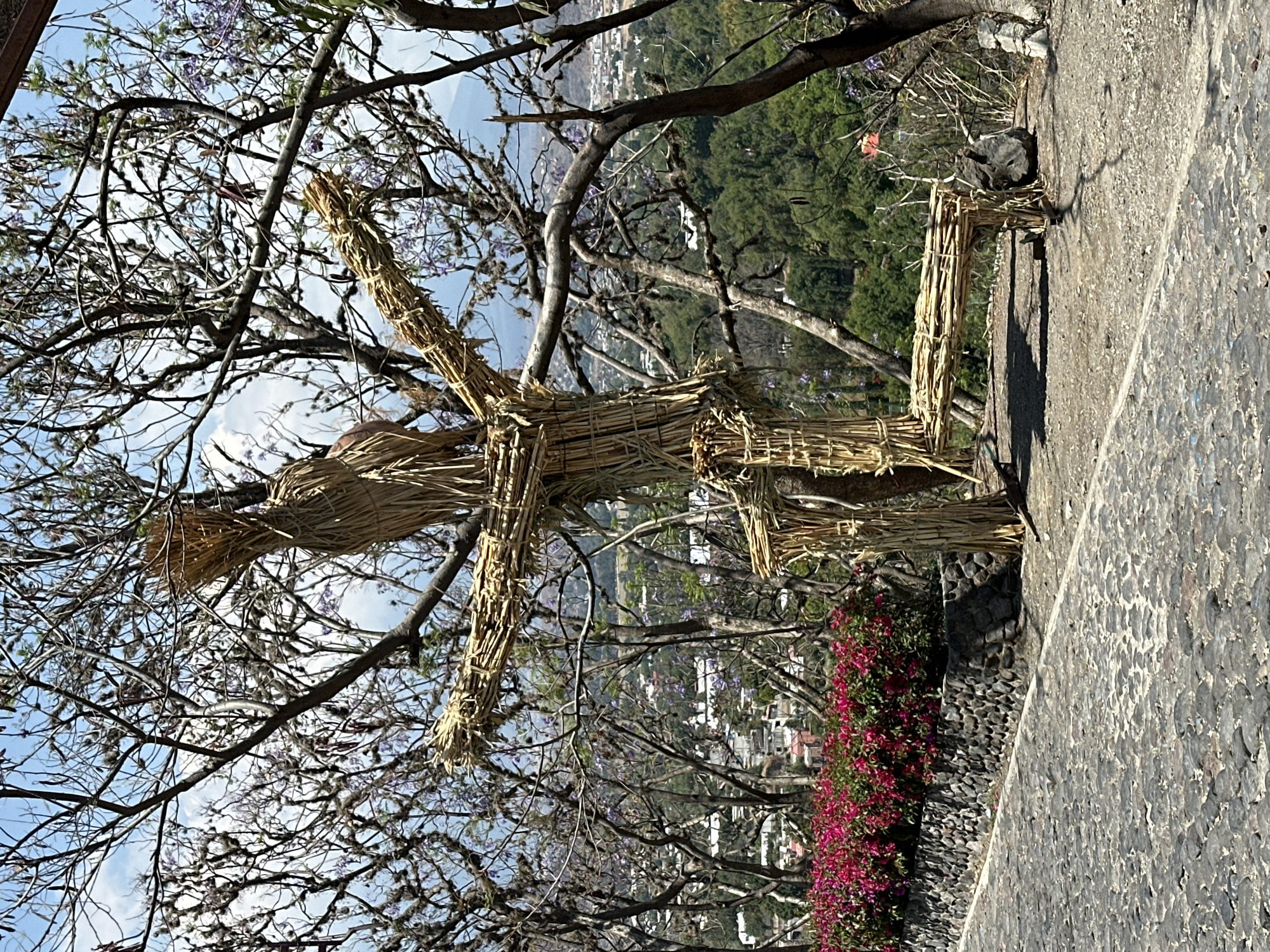 Straw figure and portrait captured at Atlixco scenic overlook