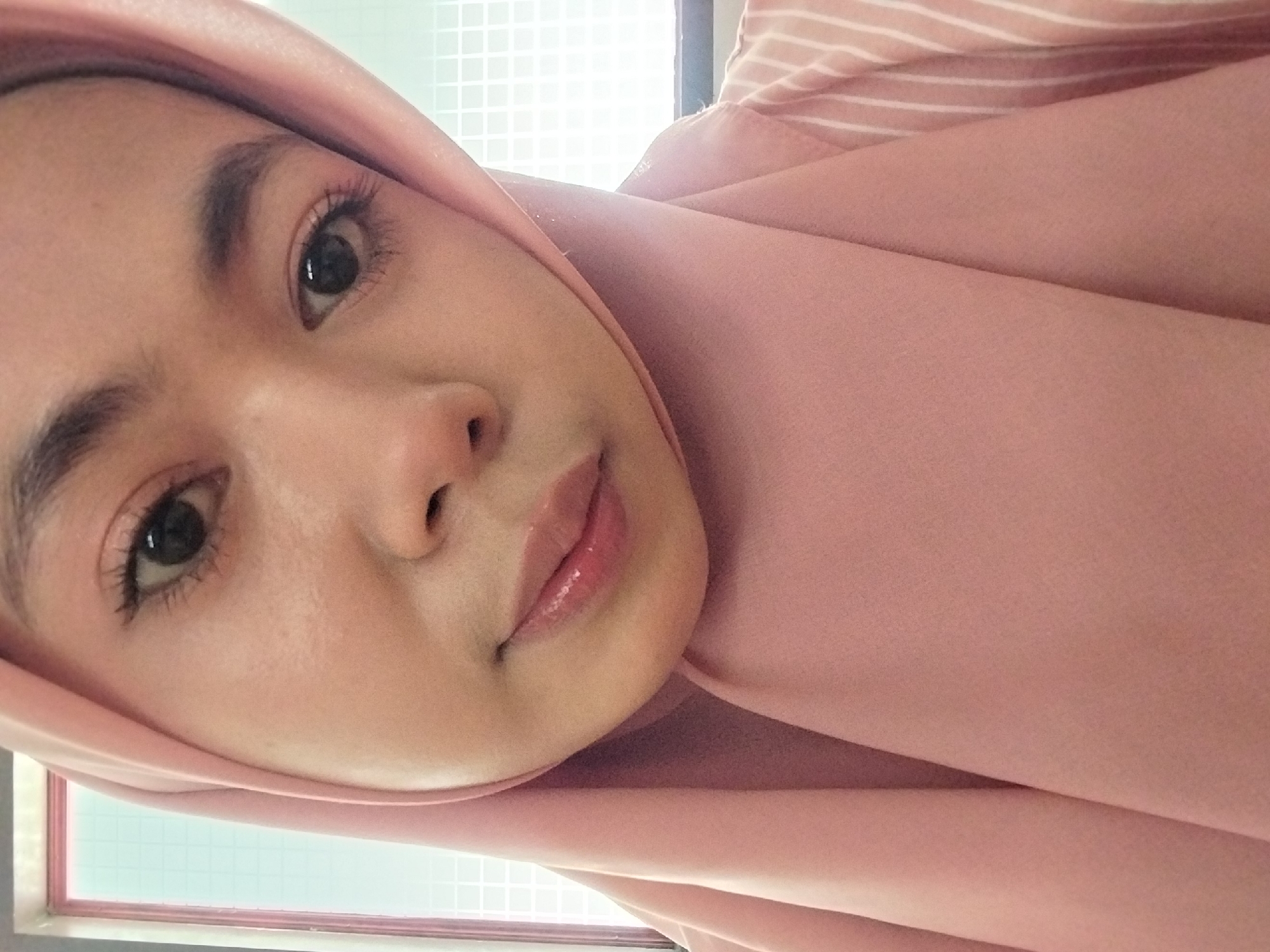Indoor selfie session in a Tibojong home, July 2026