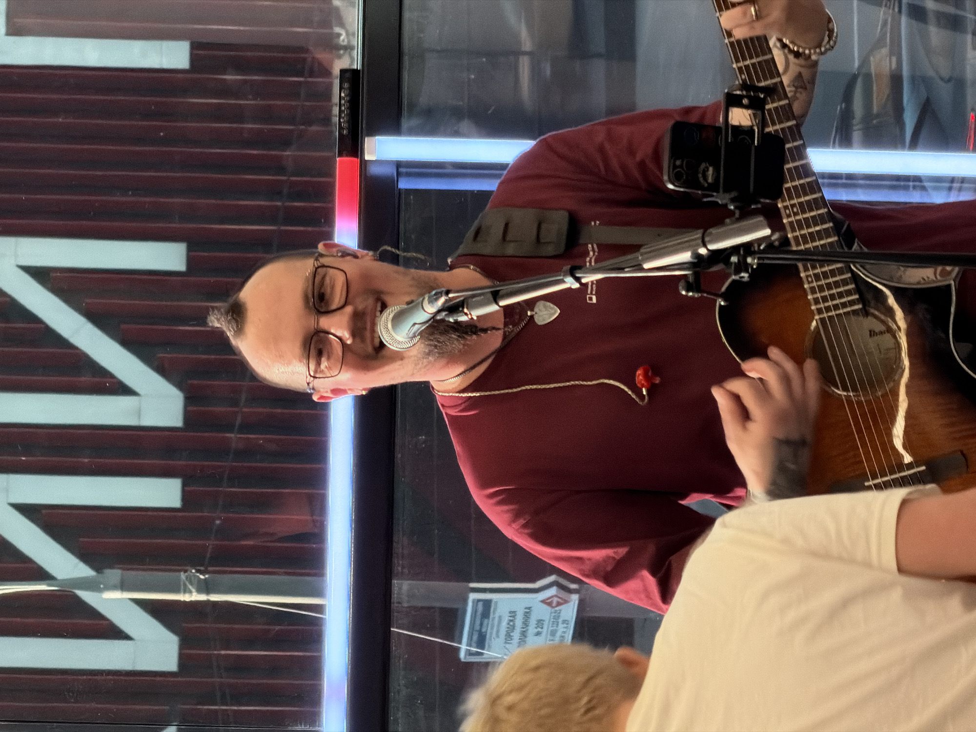 Street musician performs acoustic set in central Moscow