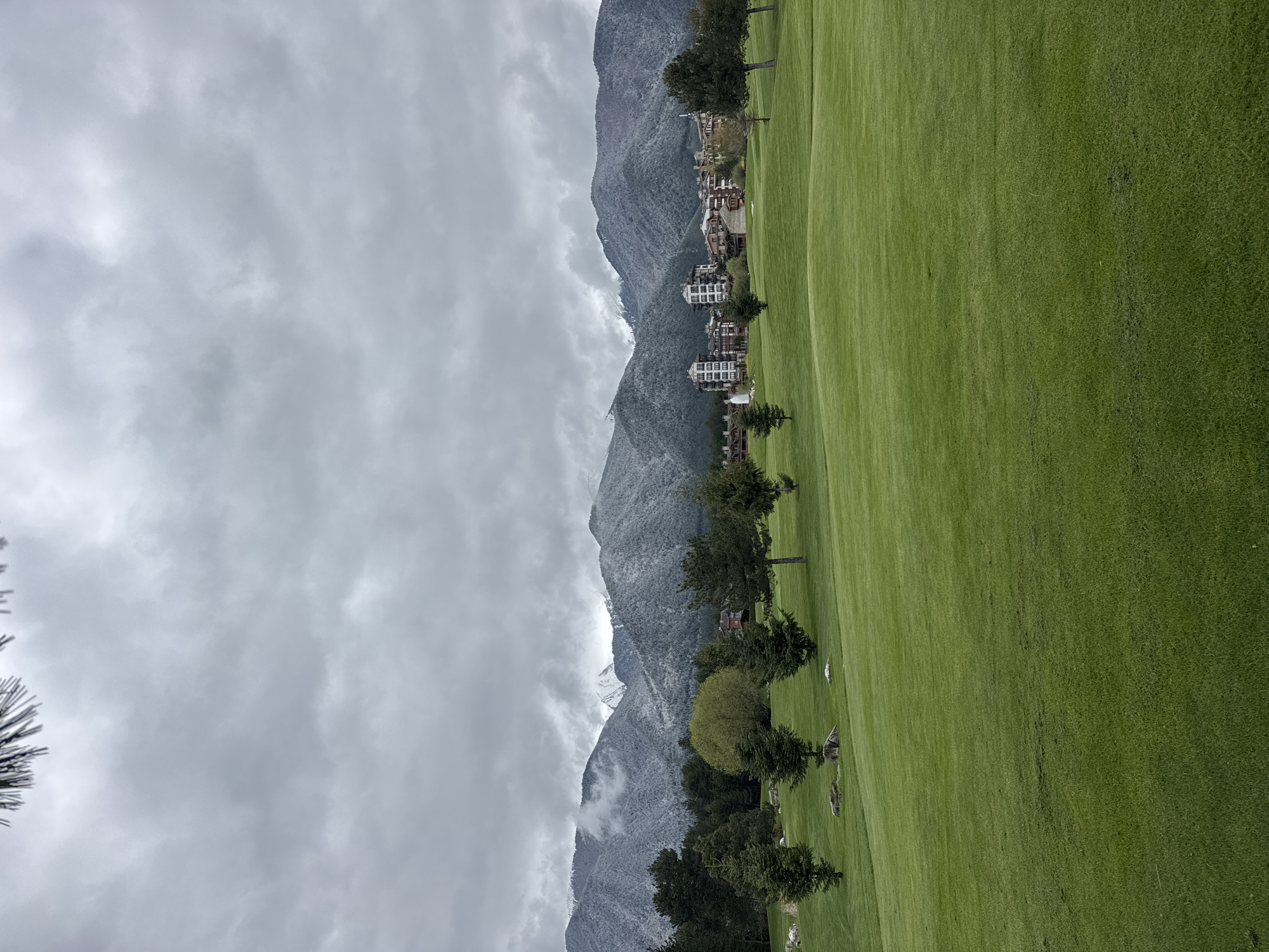 Golf resort landscape captured amid snowy mountains in Razlog