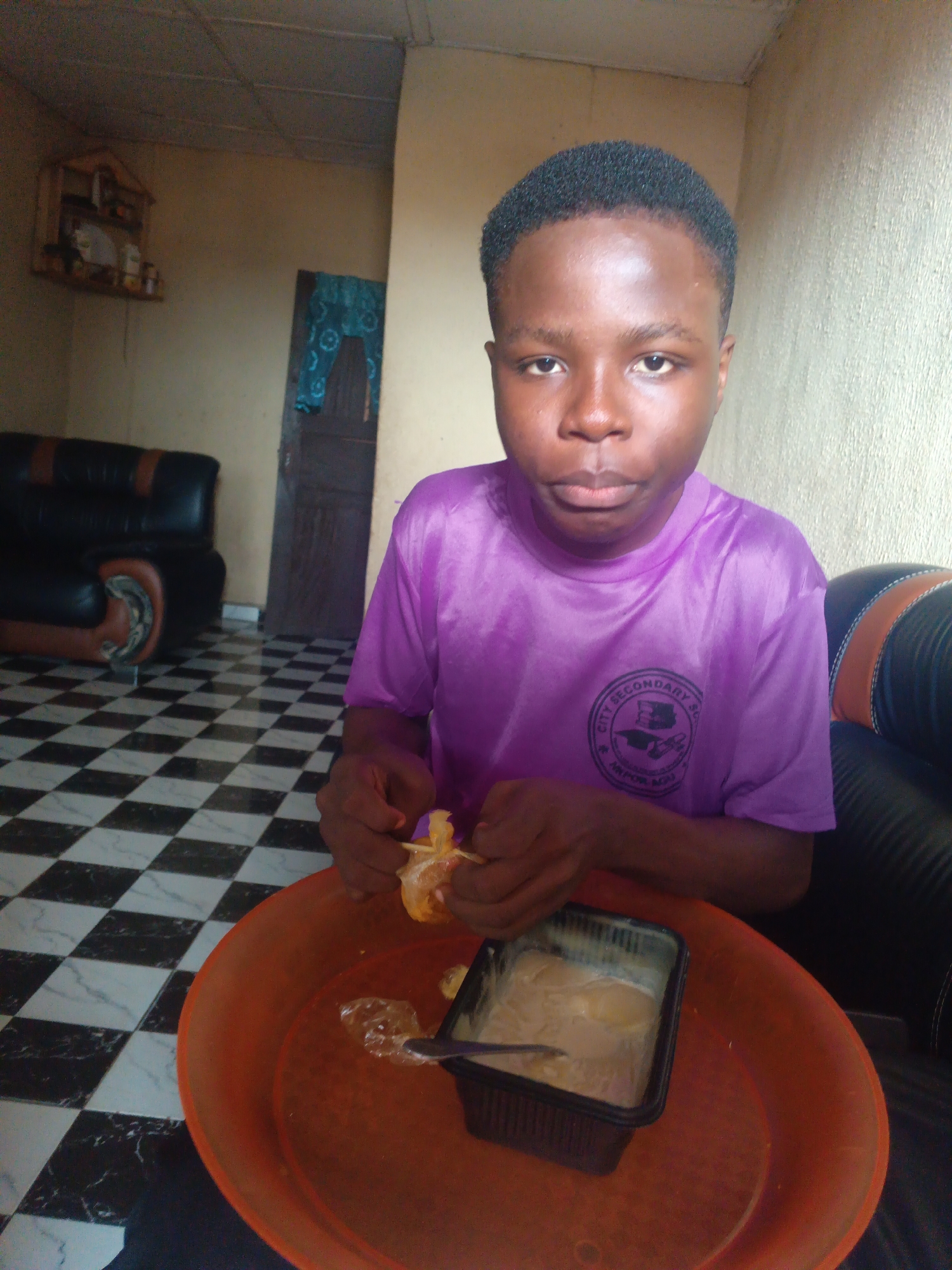 Family breakfast captured in Onitsha, Nigeria morning scene