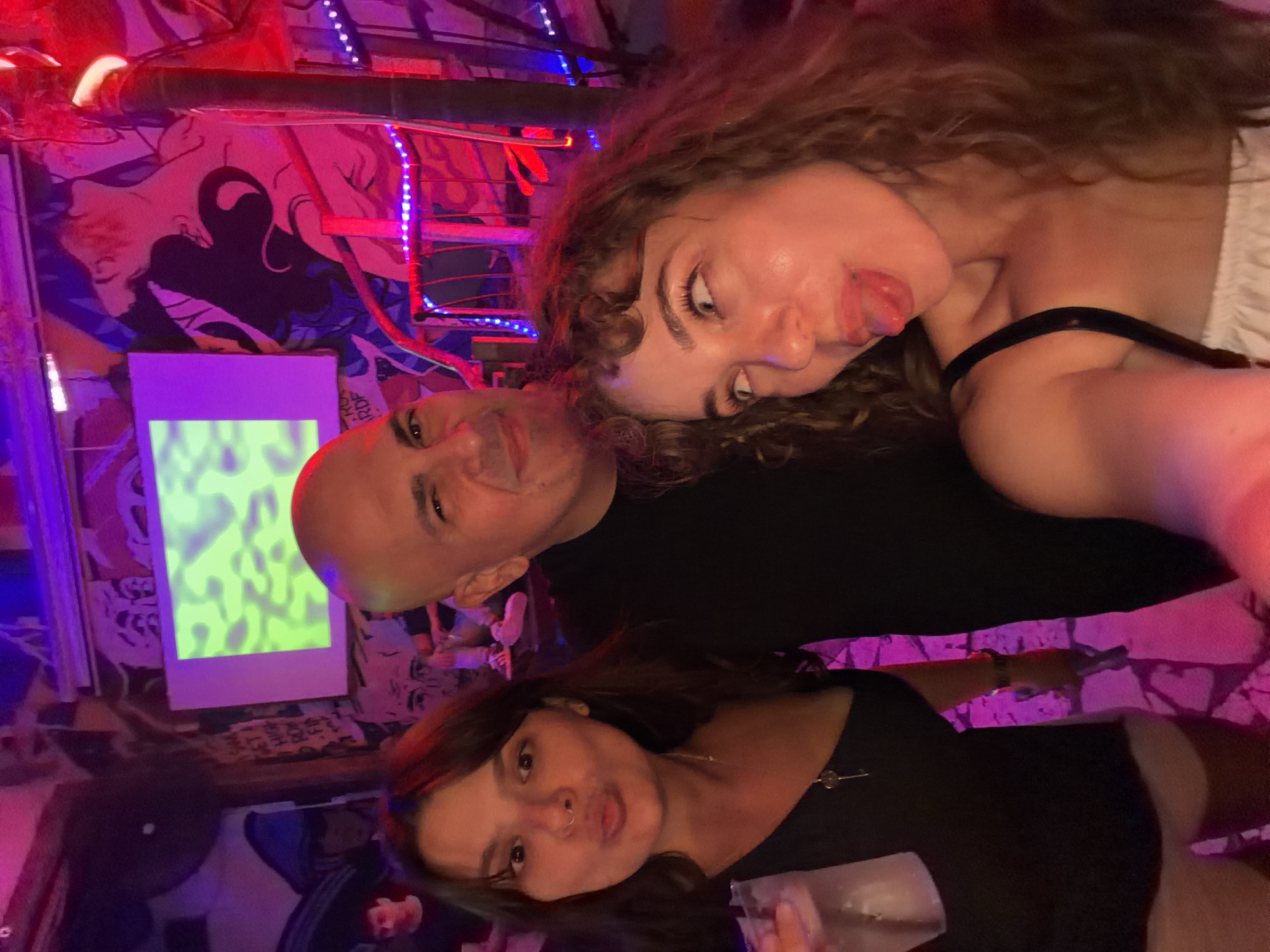 Tel Aviv nightclub scene under neon lights