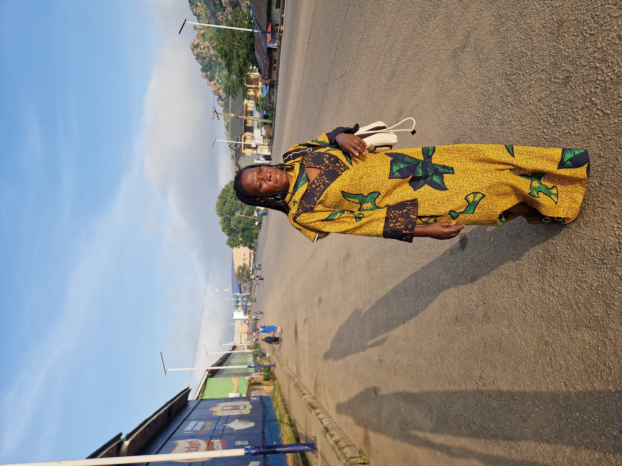 Morning street life in Kabong: roadside frying, school runs, daily movement