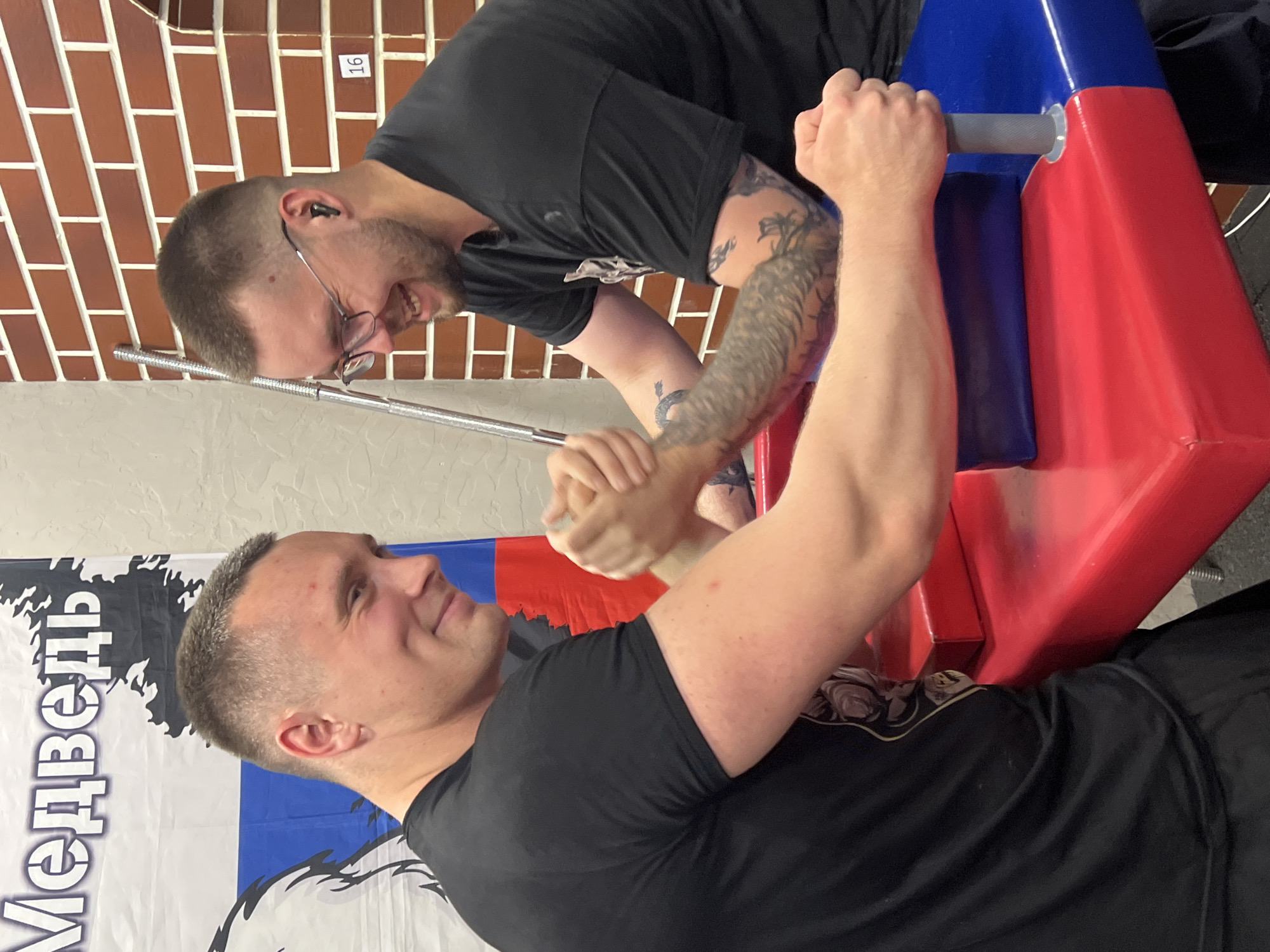 Arm wrestling training session at a Moscow gym
