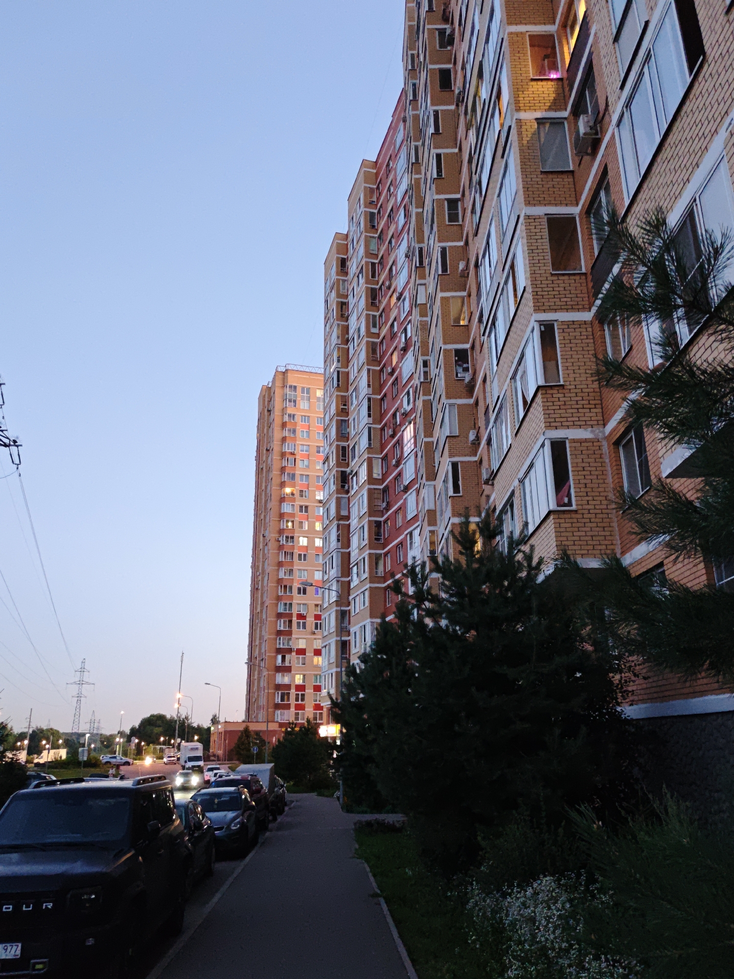Summer evening in a Shcherbinka residential neighborhood, dusk to night