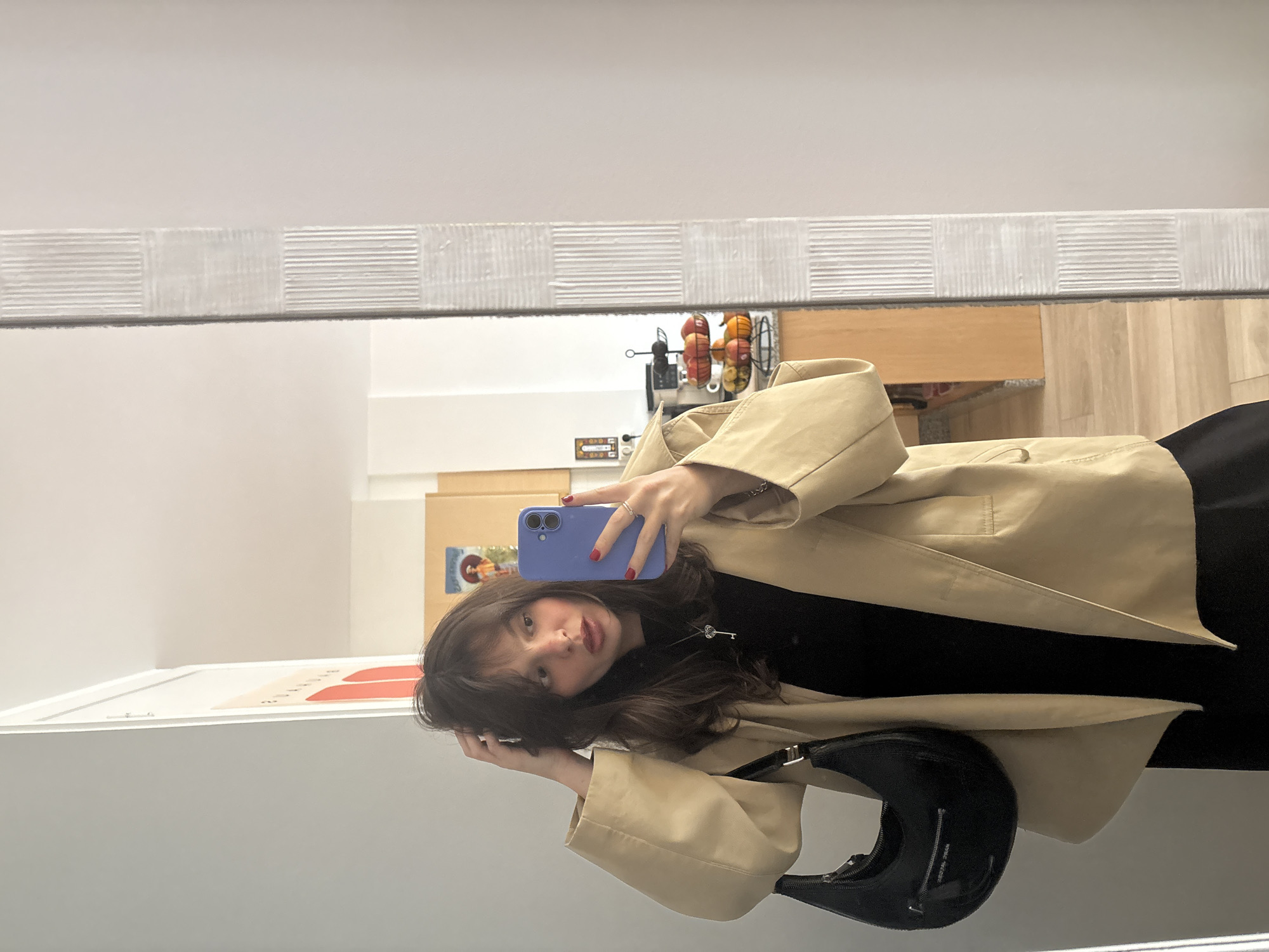 Woman takes mirror selfie in Santiago de Compostela