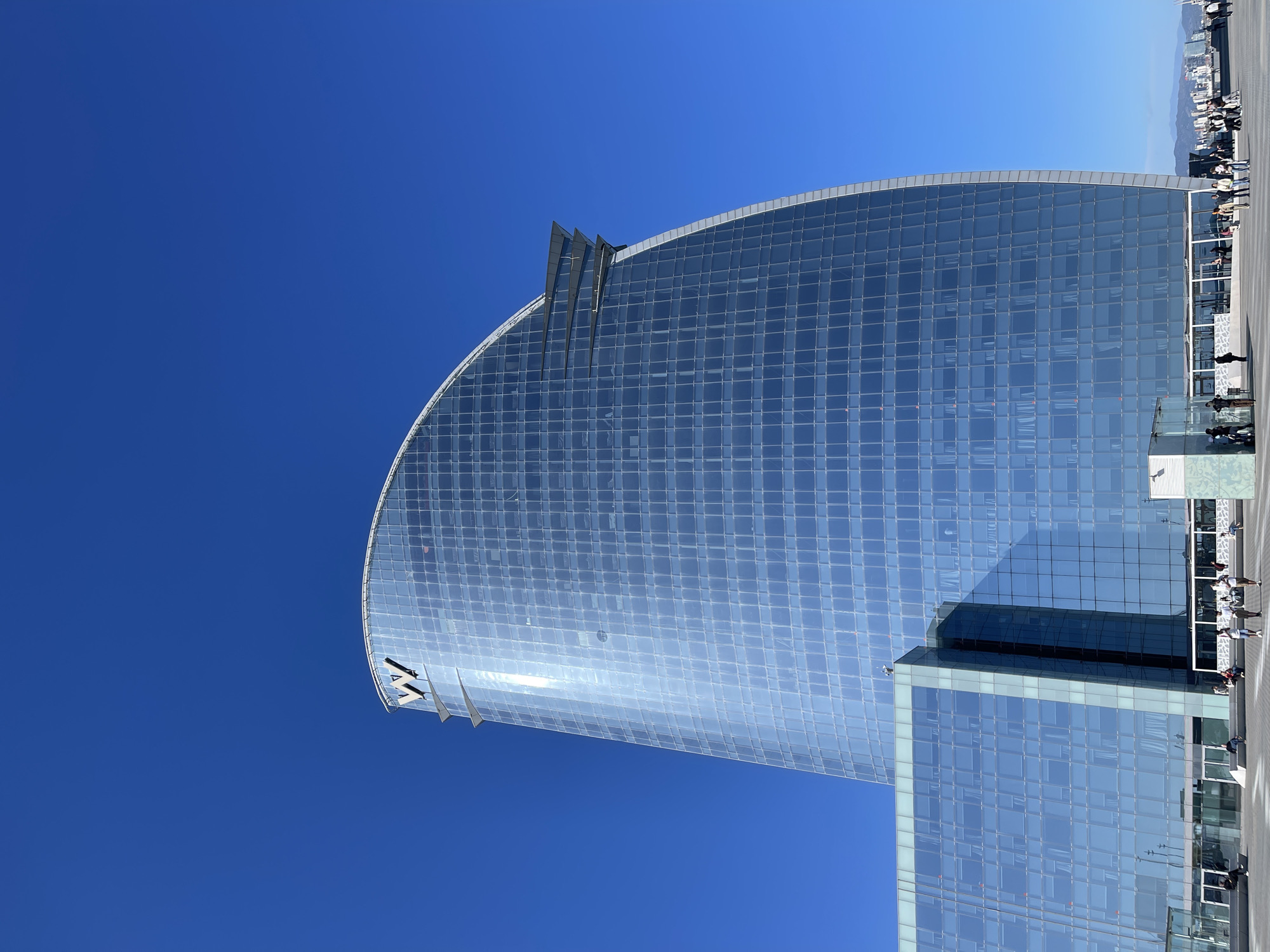 W Barcelona hotel photographed against clear skies Friday afternoon