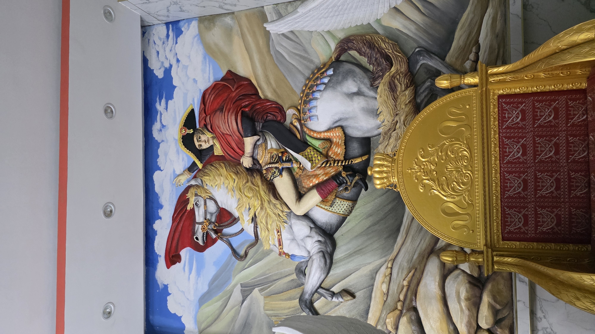 Ornate sculptures and lighting documented in Nha Trang building
