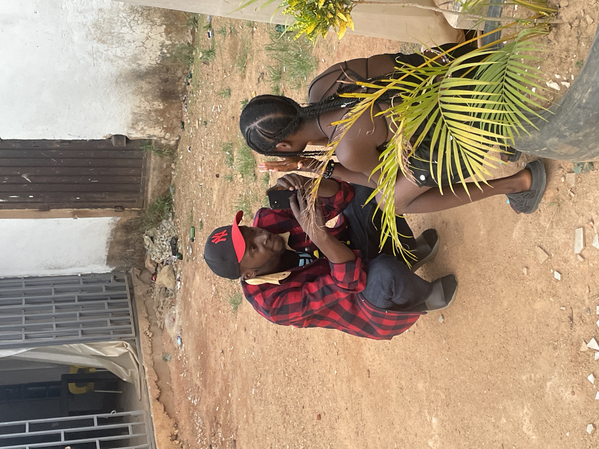 Residents photographed around Barakin Akawo businesses and lounge area