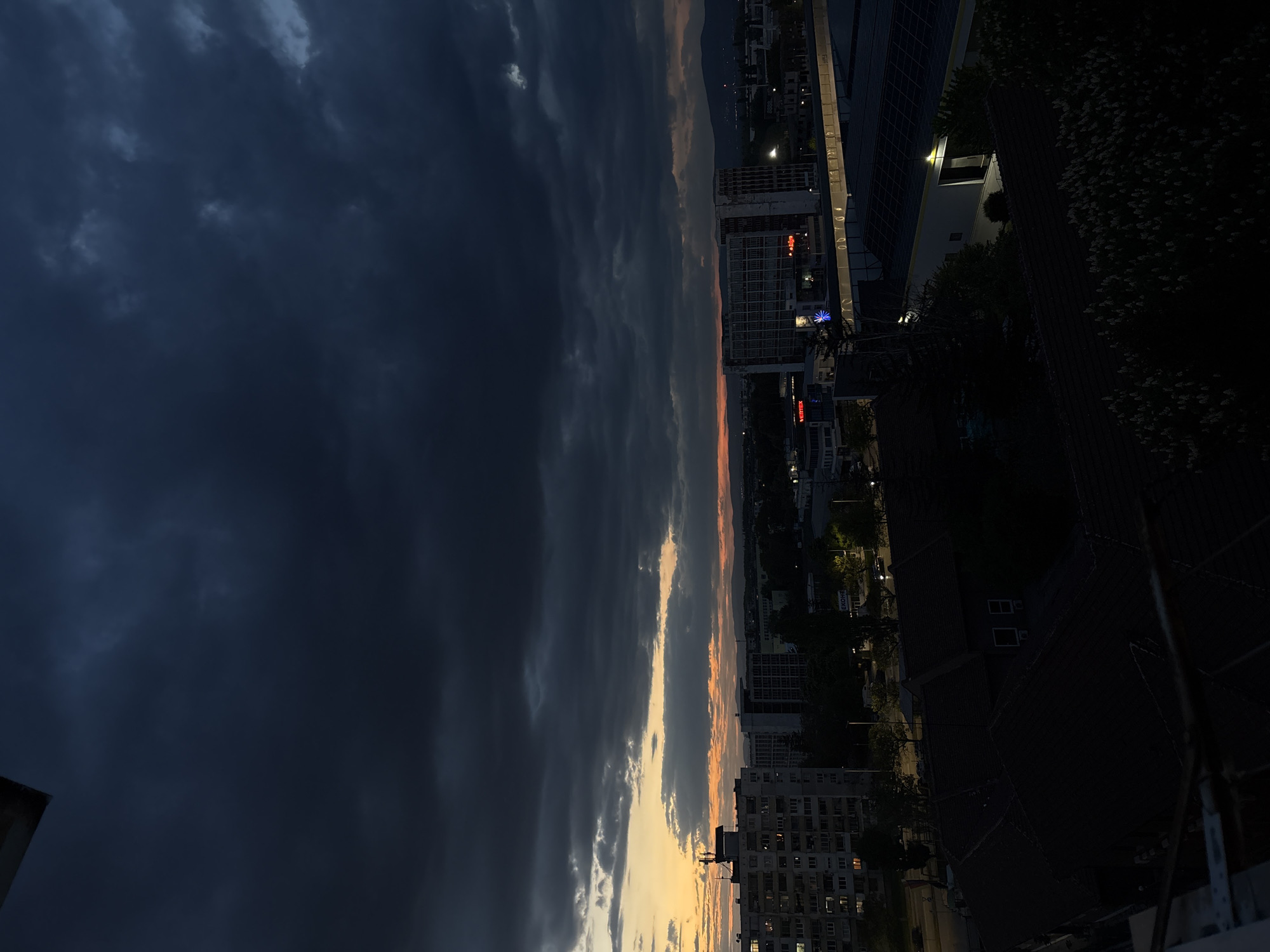 Evening cannabis session on Sofia balcony during storm