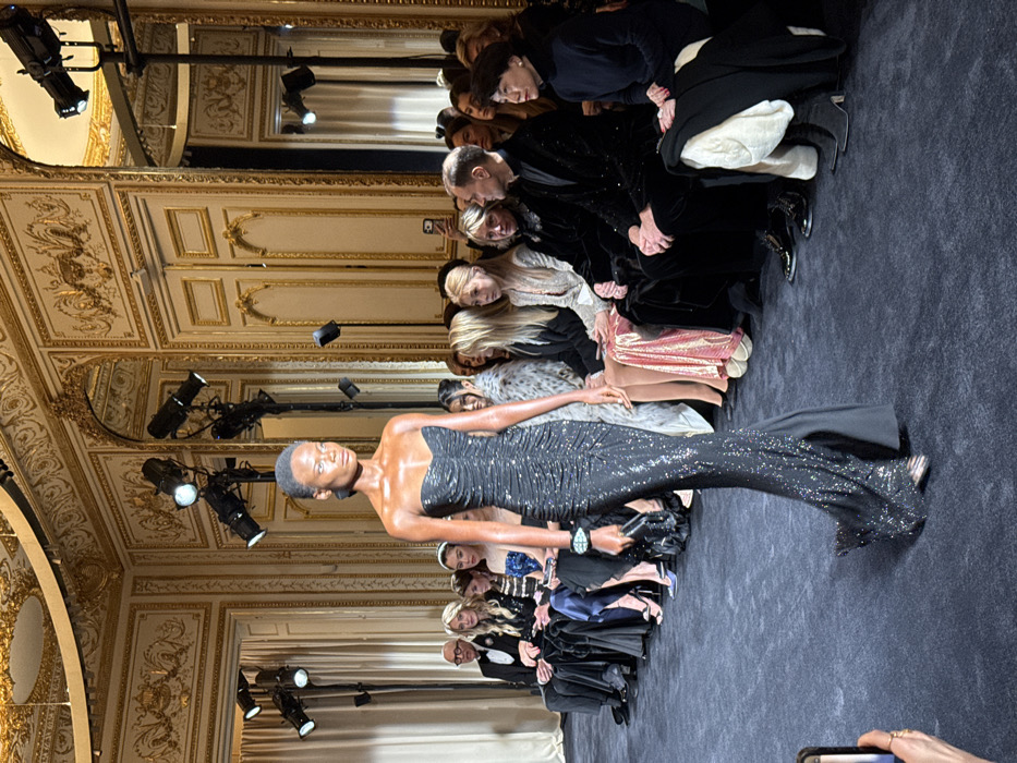 Fashion show features evening wear in ornate Paris venue