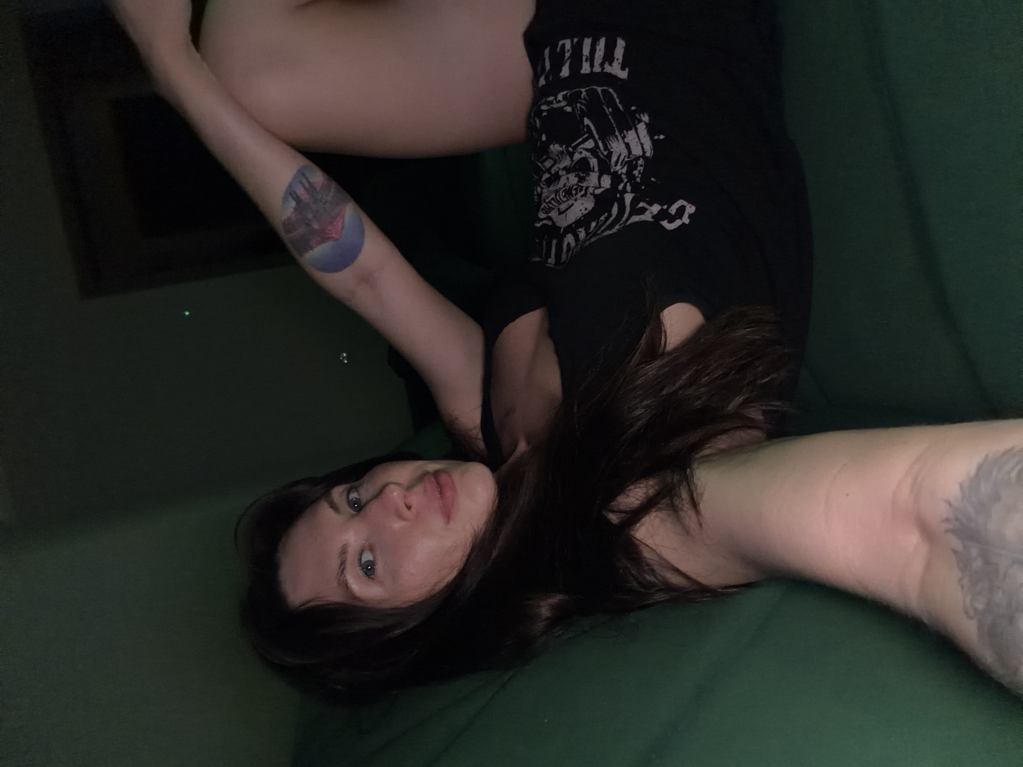 Relaxing on a green couch in Perm, casual selfie session