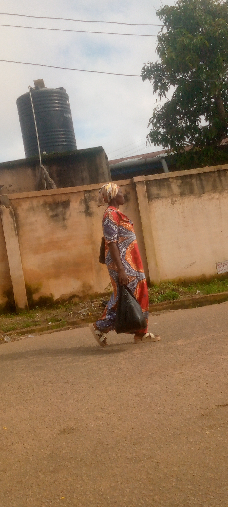 Morning foot traffic on the streets of Jos, Nigeria