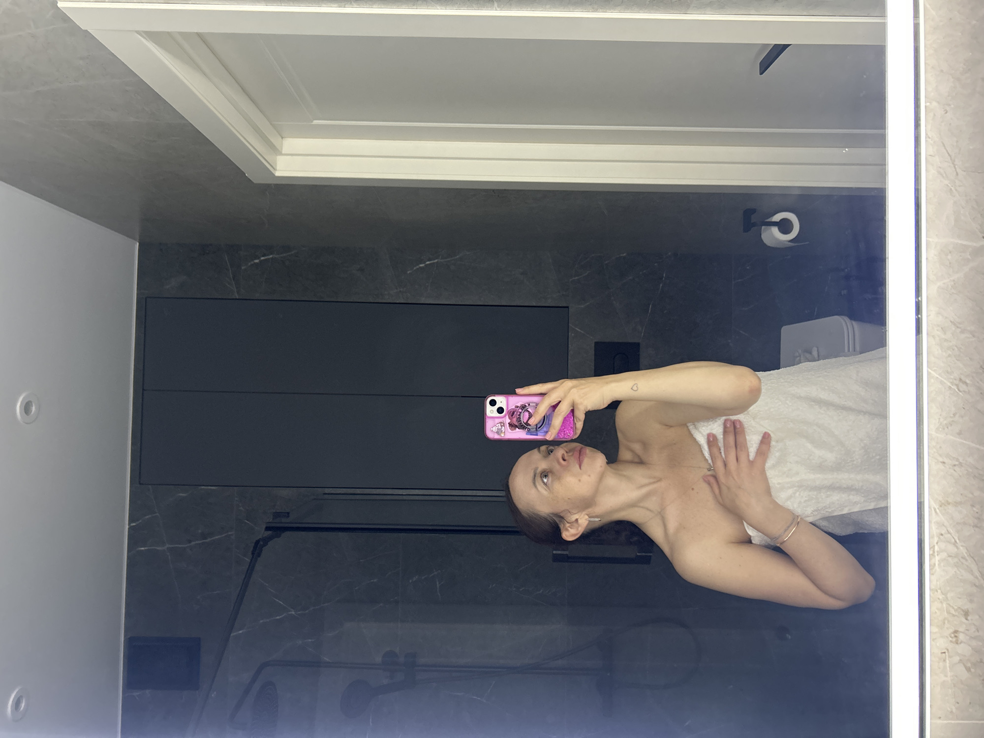 Woman documents evening routine in bathroom selfies in Yekaterinburg