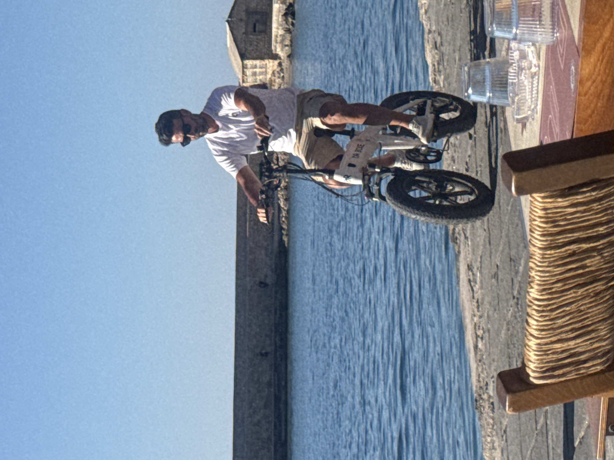 Afternoon leisure activity captured along Chania's Venetian harbor waterfront
