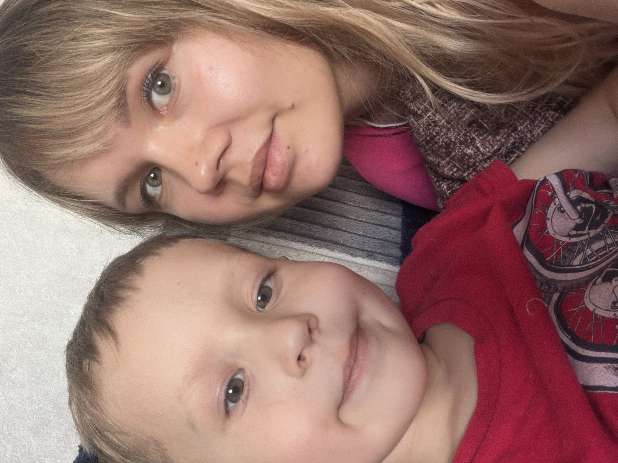 Two people captured in indoor selfie, April 25