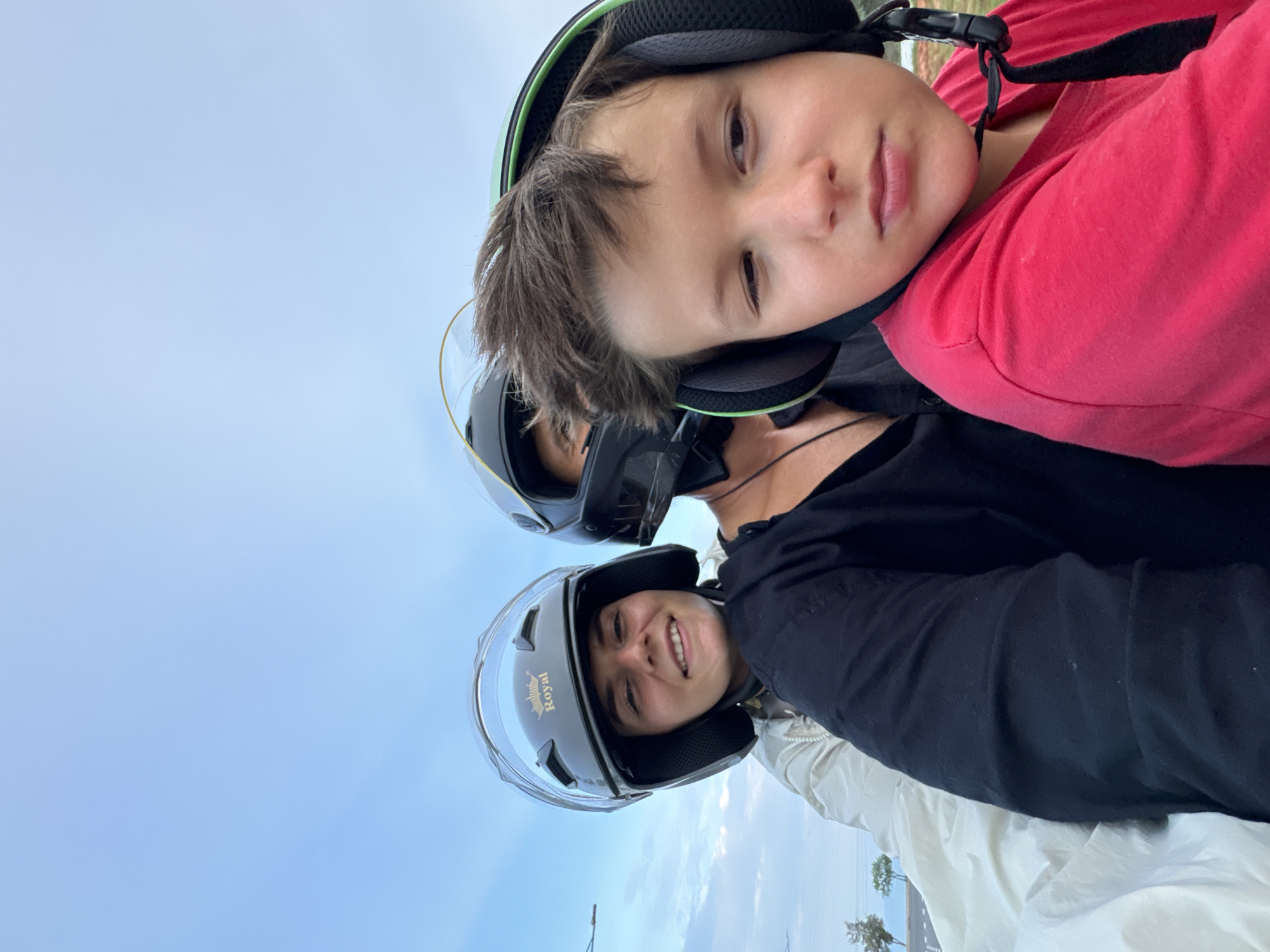 Helmet-wearing duo takes motorcycle selfies in Mũi Né