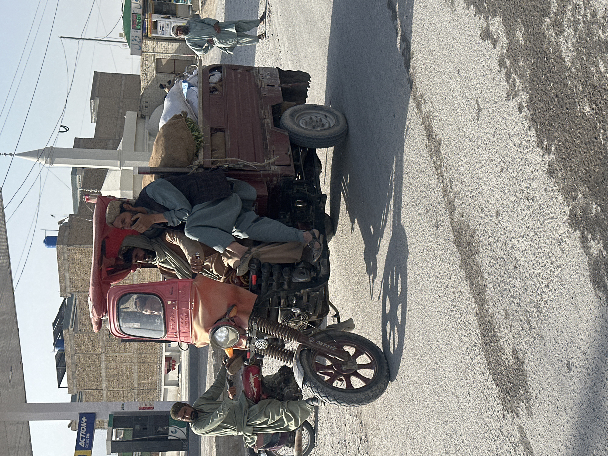 Three-wheeler carries passengers and goods in Quetta, Pakistan