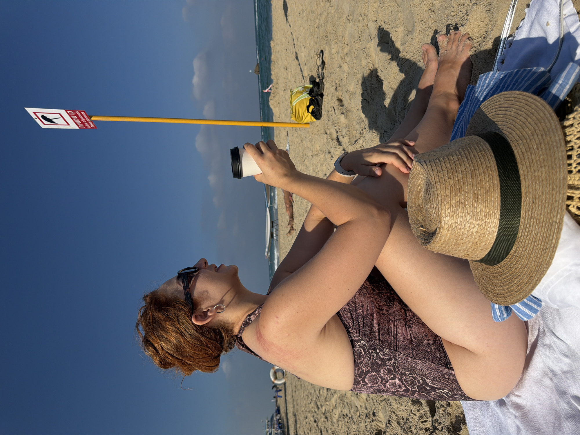 Summer morning at Bat Yam beach, coffee and waves