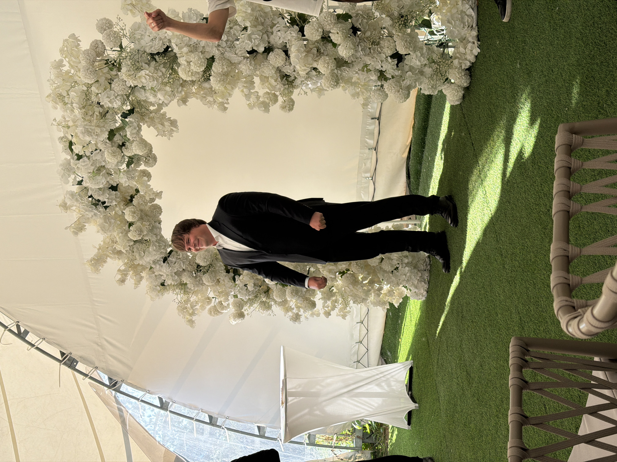 Outdoor wedding ceremony under white tent in Pavlodar, Kazakhstan