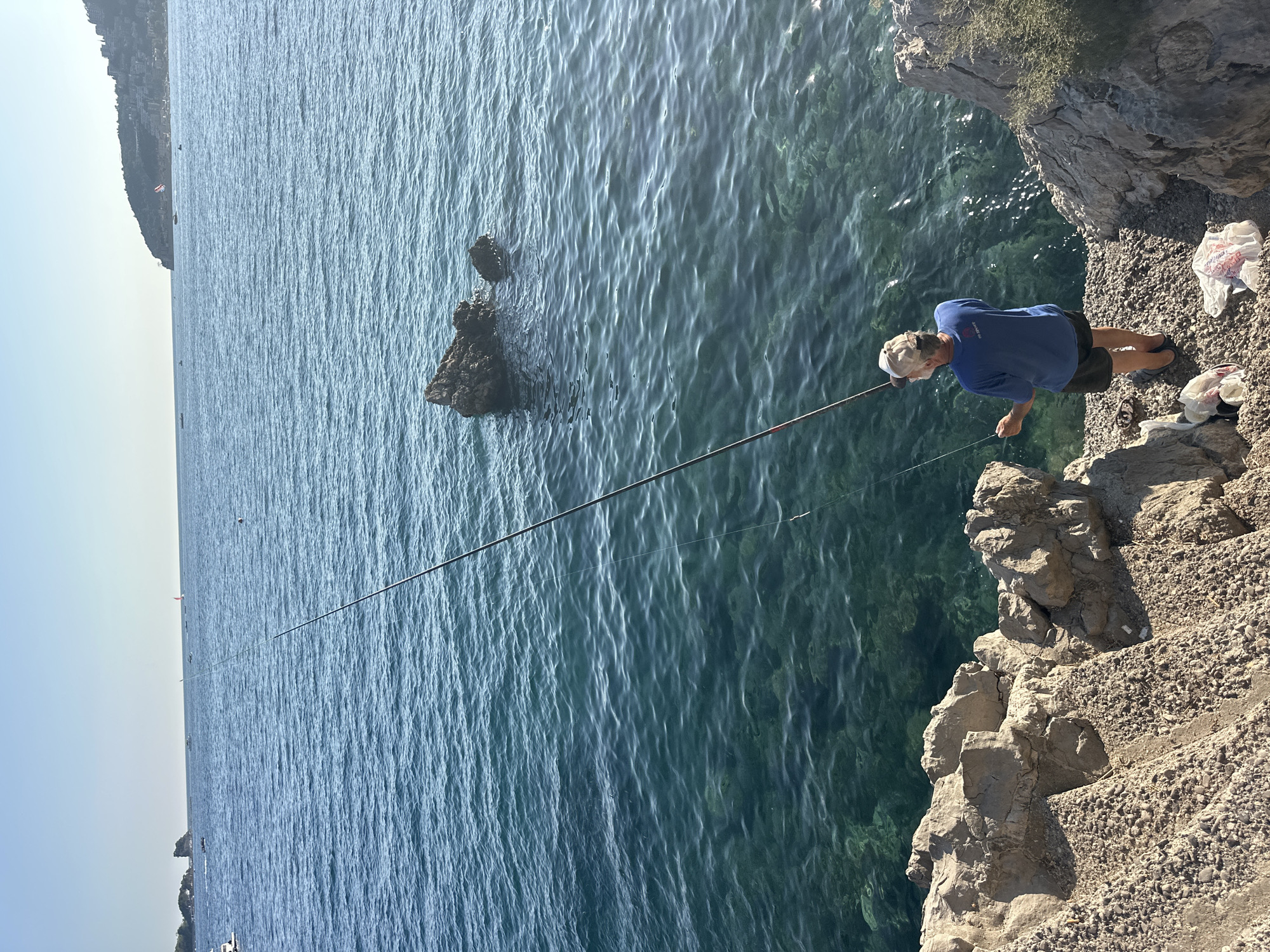 Fishing and paddleboarding on Budva's Adriatic coast